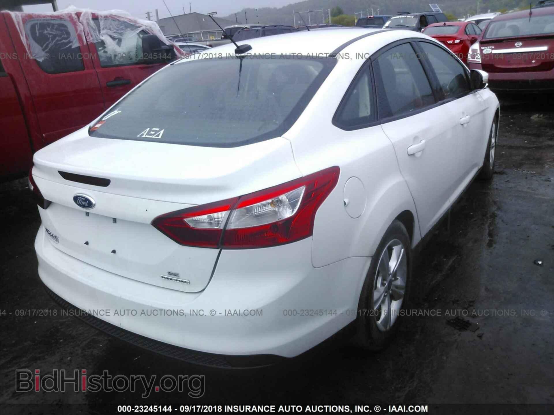 2014 Ford Focus - VIN: 1FADP3F27EL207181 - Photo 4