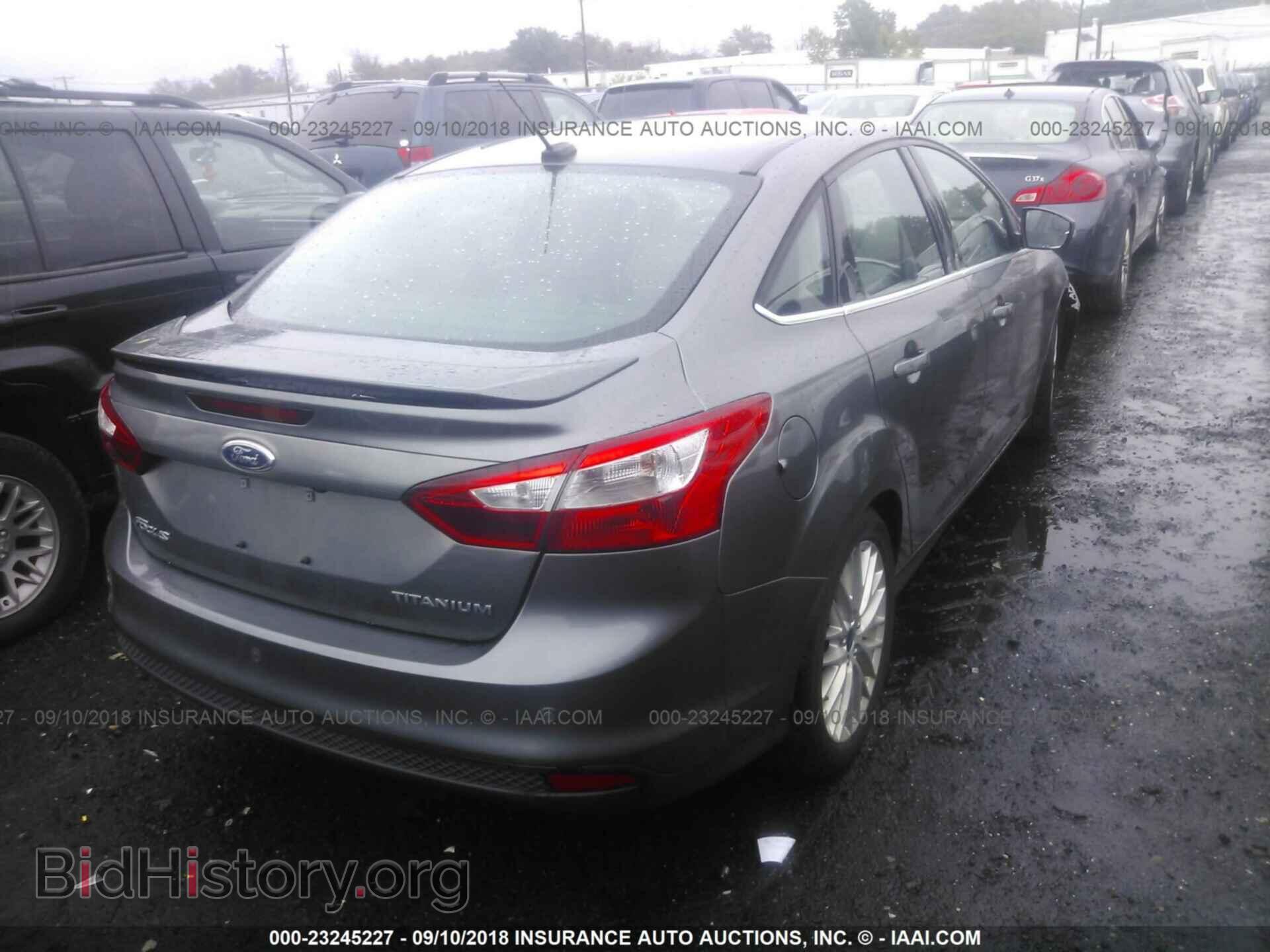 2014 Ford Focus - VIN: 1FADP3J26EL178683 - Фото 4
