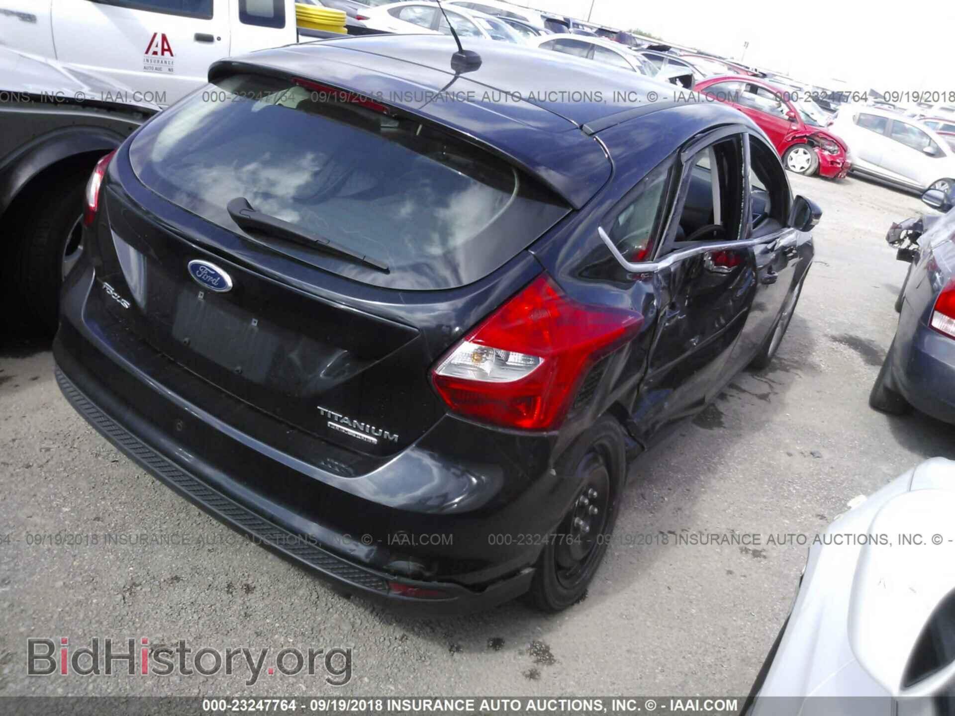 2014 Ford Focus - VIN: 1FADP3N24EL122798 - Фото 4