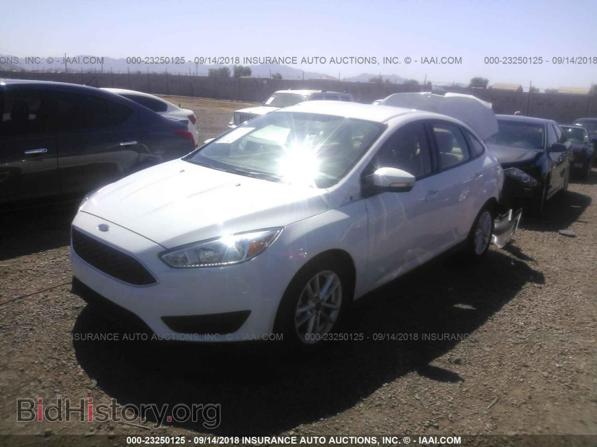 2016 Ford Focus - VIN: 1FADP3F28GL395888 - Photo 2