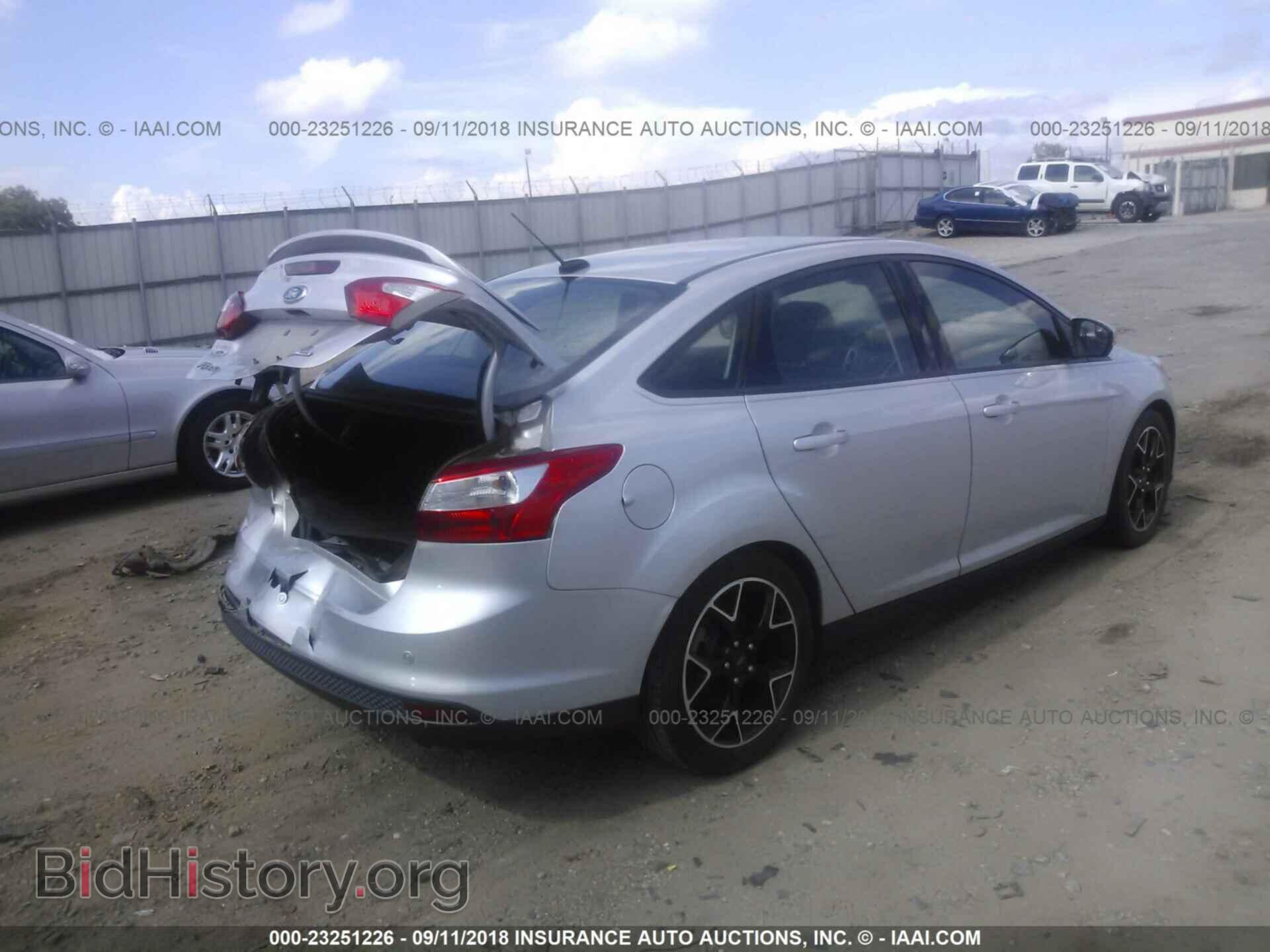 2014 Ford Focus - VIN: 1FADP3F22EL159668 - Фото 4