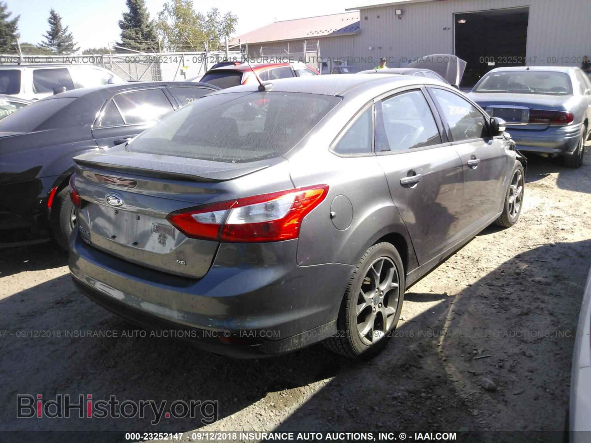 2013 Ford Focus - VIN: 1FADP3F22DL205305 - Photo 4