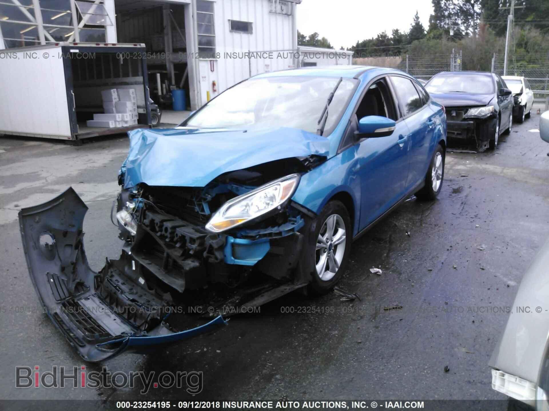 2014 Ford Focus - VIN: 1FADP3F28EL447033 - Фото 2