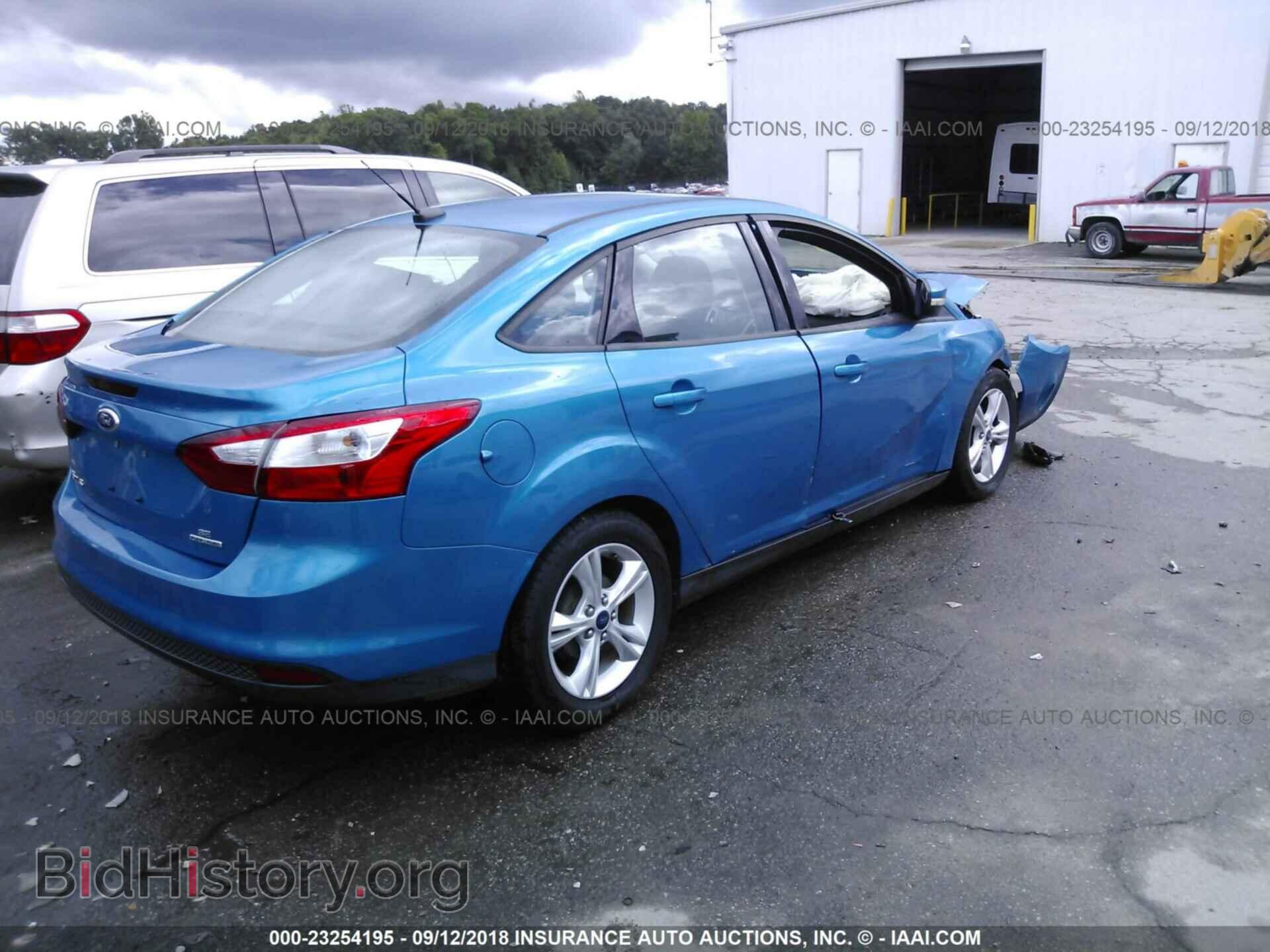 2014 Ford Focus - VIN: 1FADP3F28EL447033 - Фото 4