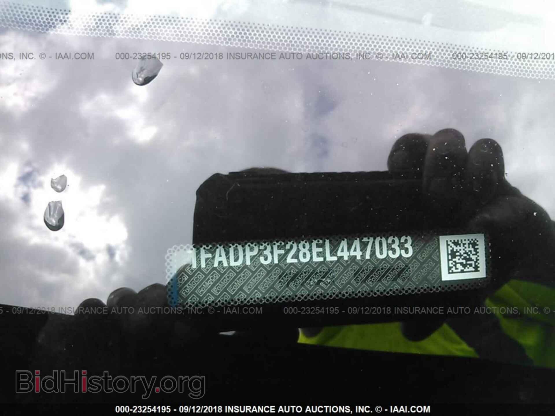 2014 Ford Focus - VIN: 1FADP3F28EL447033 - Фото 9
