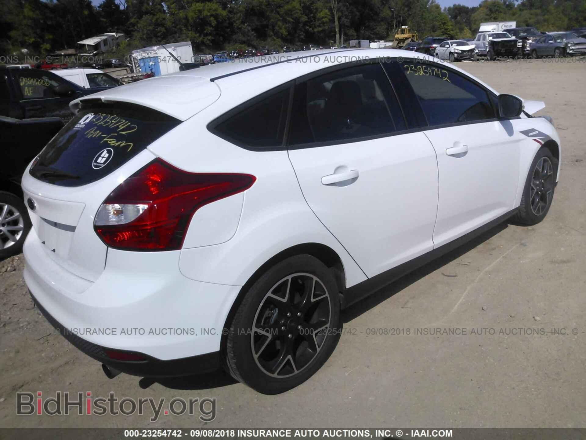 2012 Ford Focus - VIN: 1FAHP3K25CL206115 - Фото 4