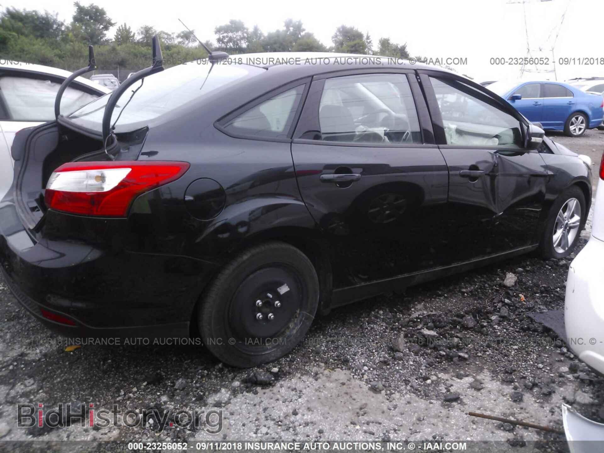 2014 Ford Focus - VIN: 1FADP3F25EL178991 - Фото 4