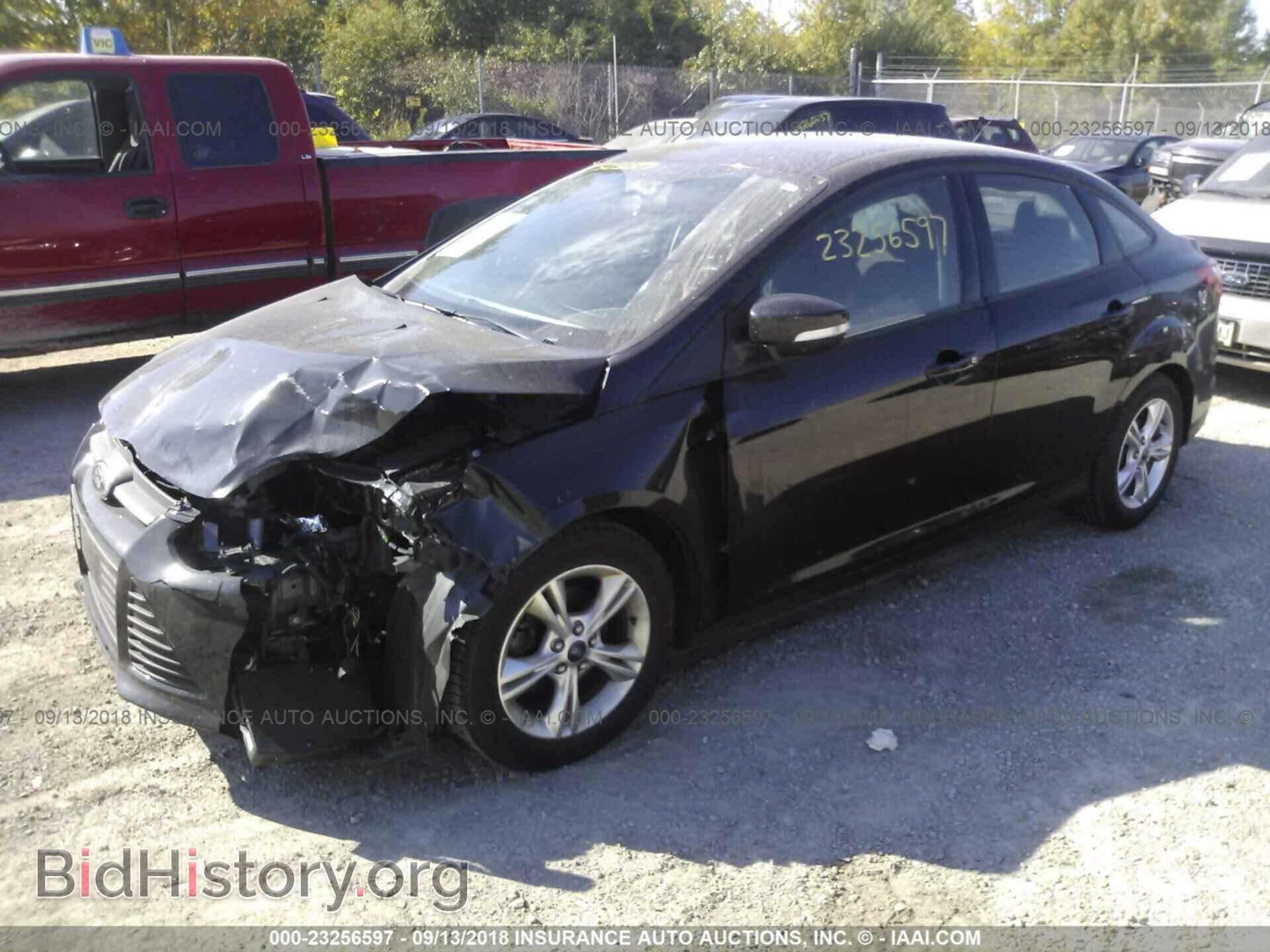 2014 Ford Focus - VIN: 1FADP3F21EL258322 - Photo 2