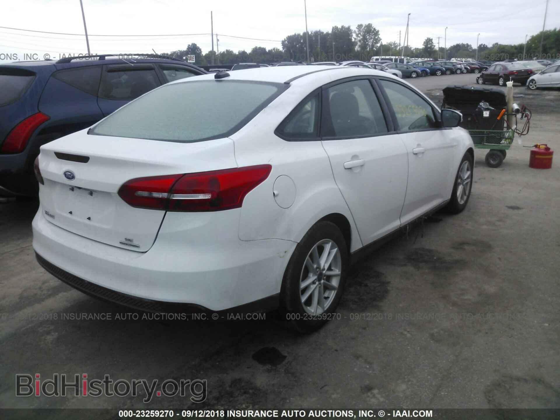 2015 Ford Focus - VIN: 1FADP3F27FL217551 - Photo 4