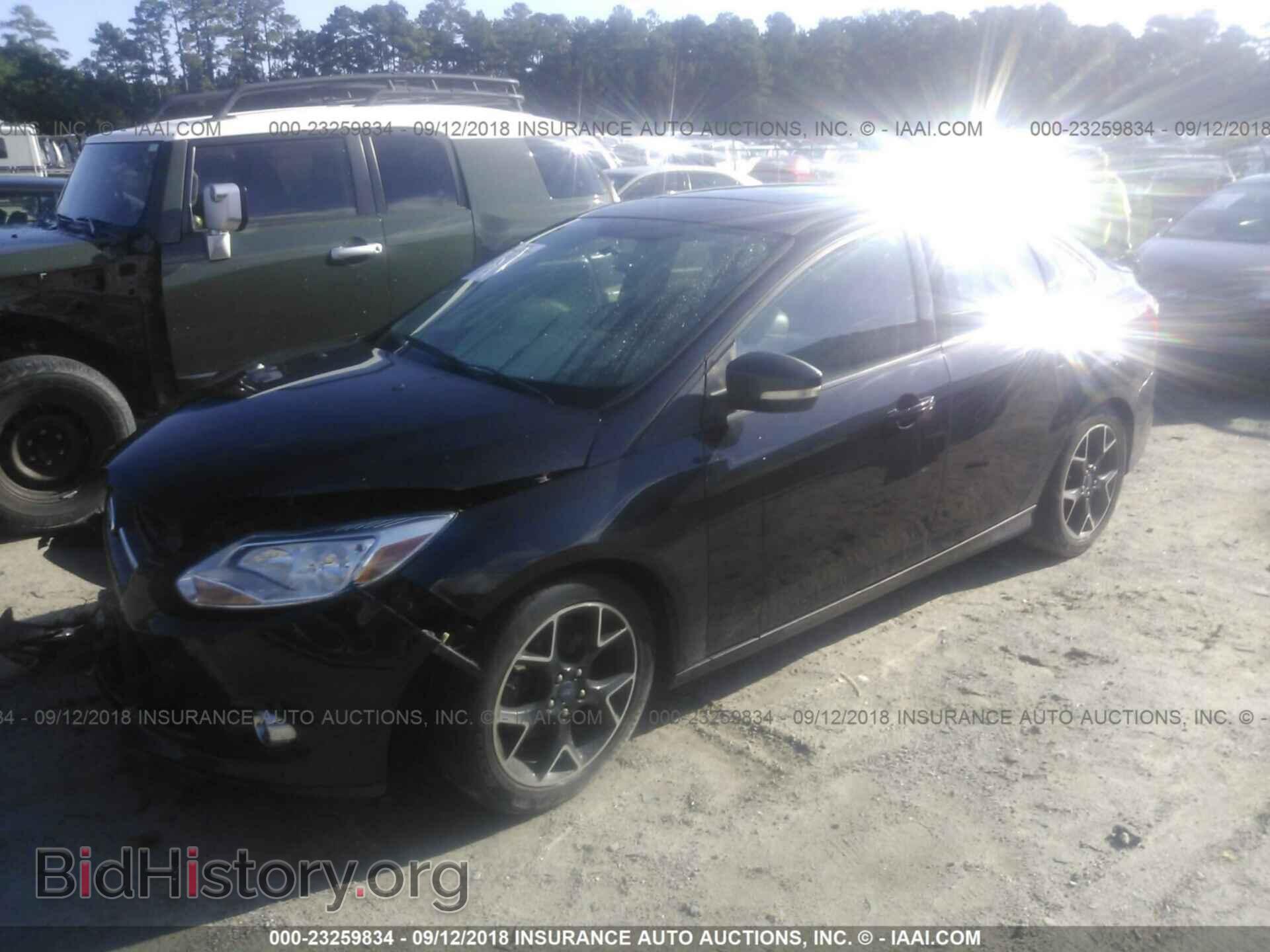 2014 Ford Focus - VIN: 1FADP3F2XEL359682 - Photo 2
