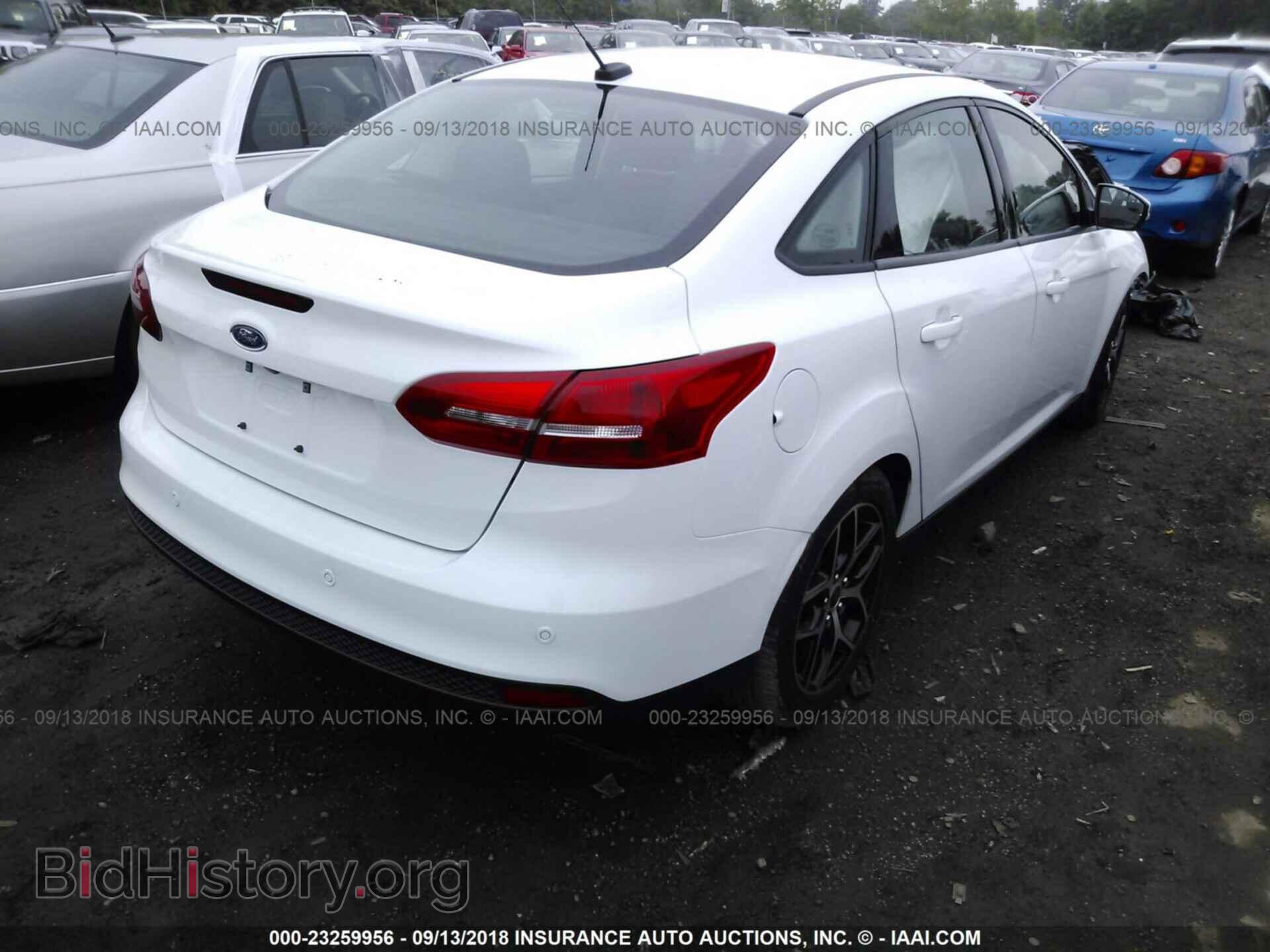 2017 Ford Focus - VIN: 1FADP3H25HL339888 - Photo 4