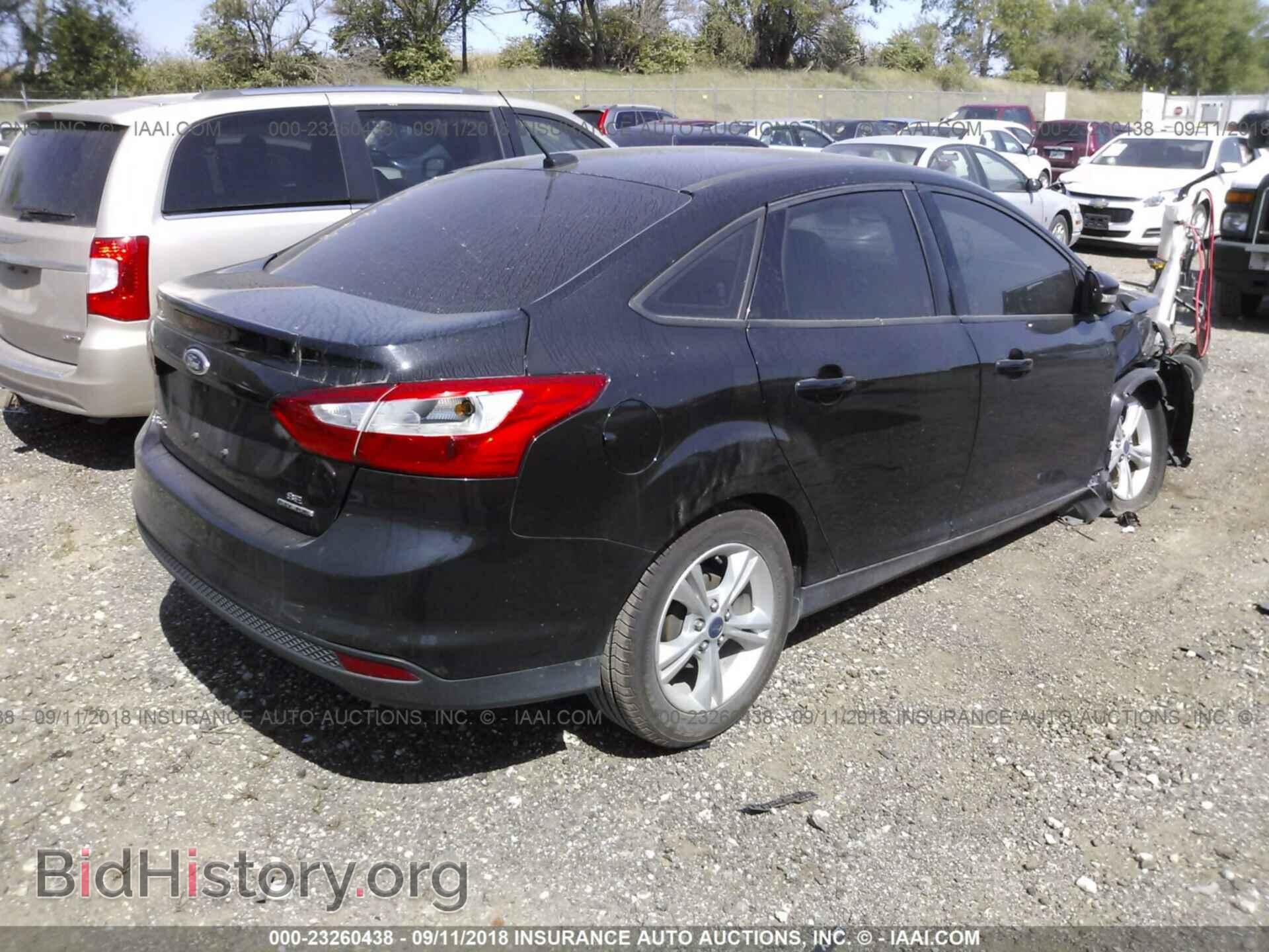 2014 Ford Focus - VIN: 1FADP3F29EL349788 - Фото 4