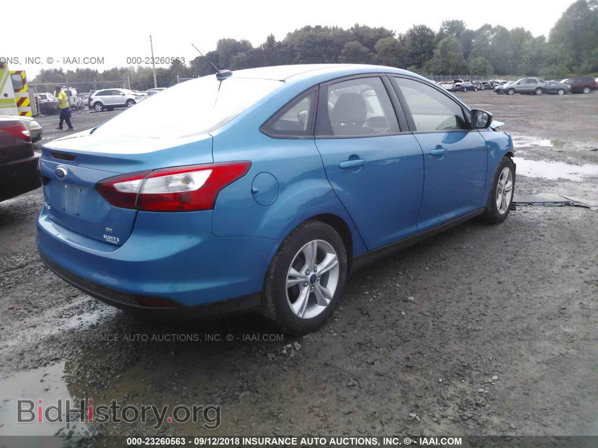 2014 Ford Focus - VIN: 1FADP3F23EL366490 - Фото 4