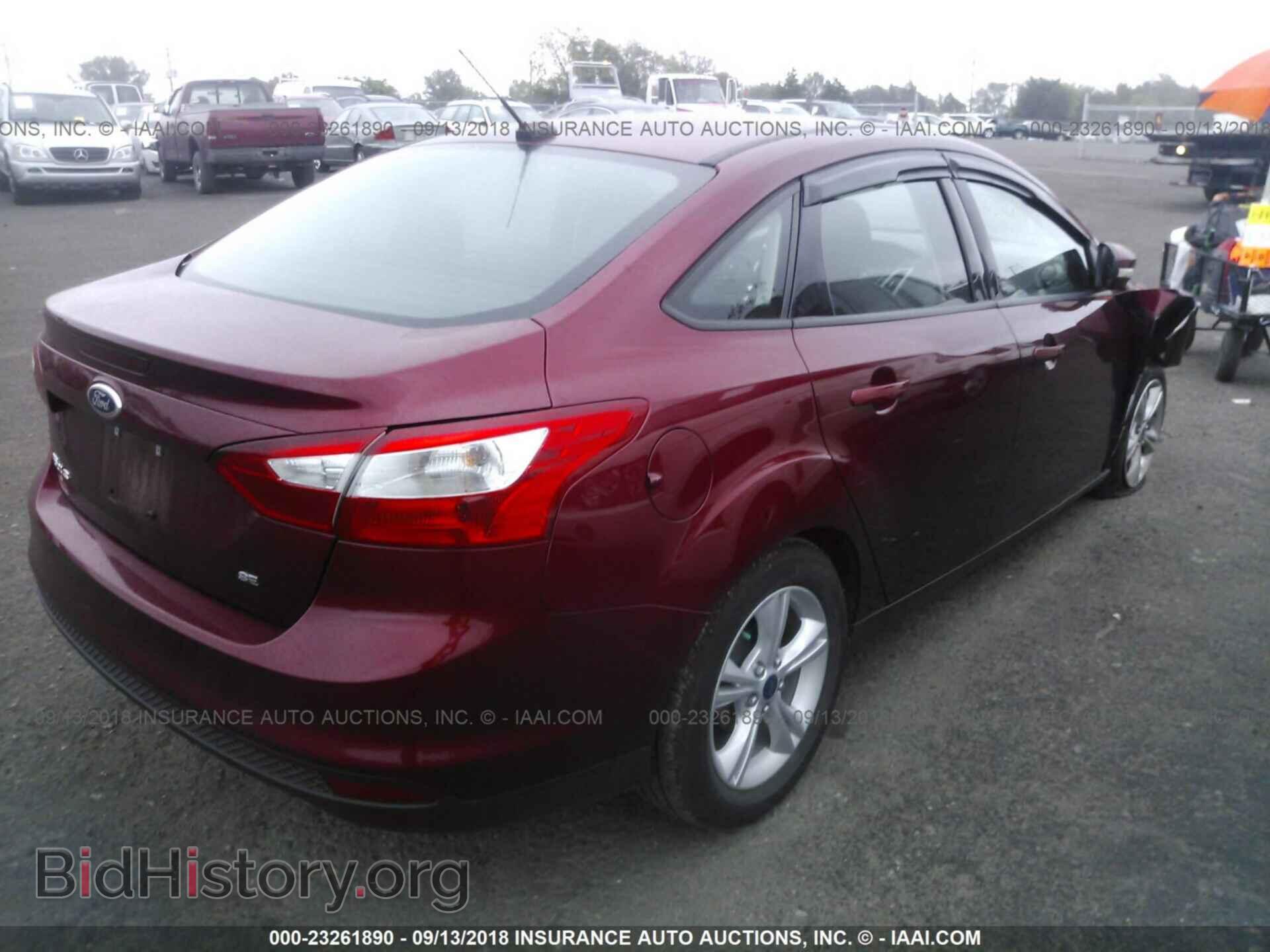 2014 Ford Focus - VIN: 1FADP3F21EL403682 - Фото 4