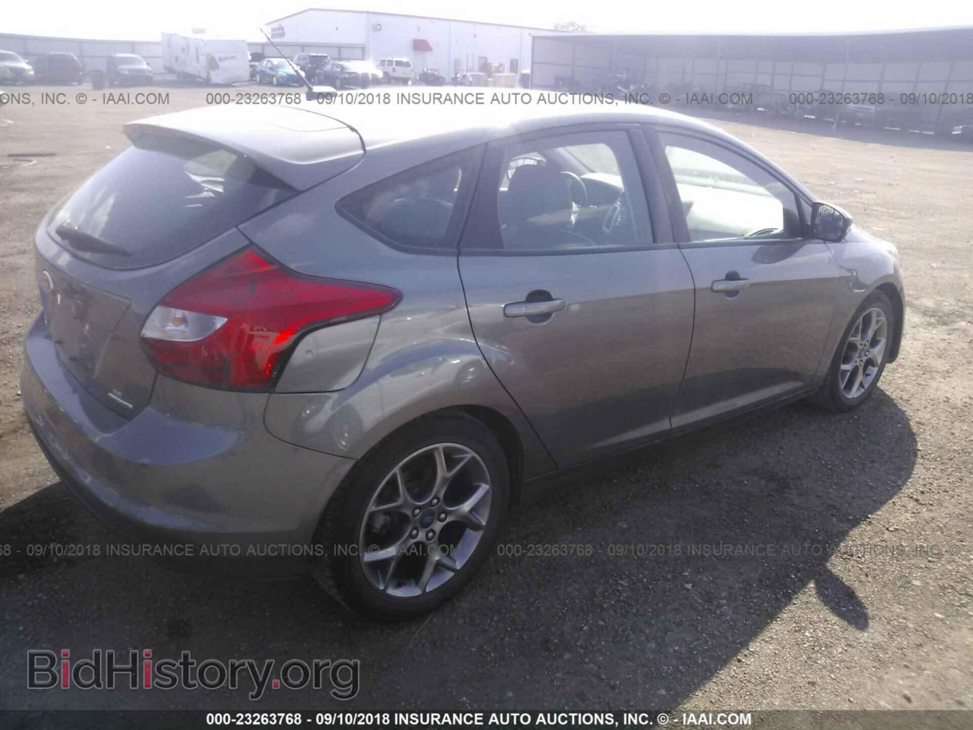 2014 Ford Focus - VIN: 1FADP3K23EL413099 - Фото 4