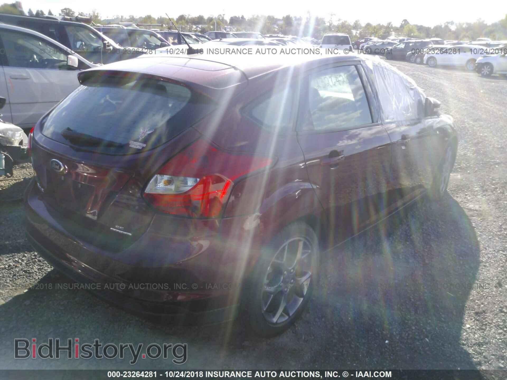 2014 Ford Focus - VIN: 1FADP3K27EL258069 - Photo 4