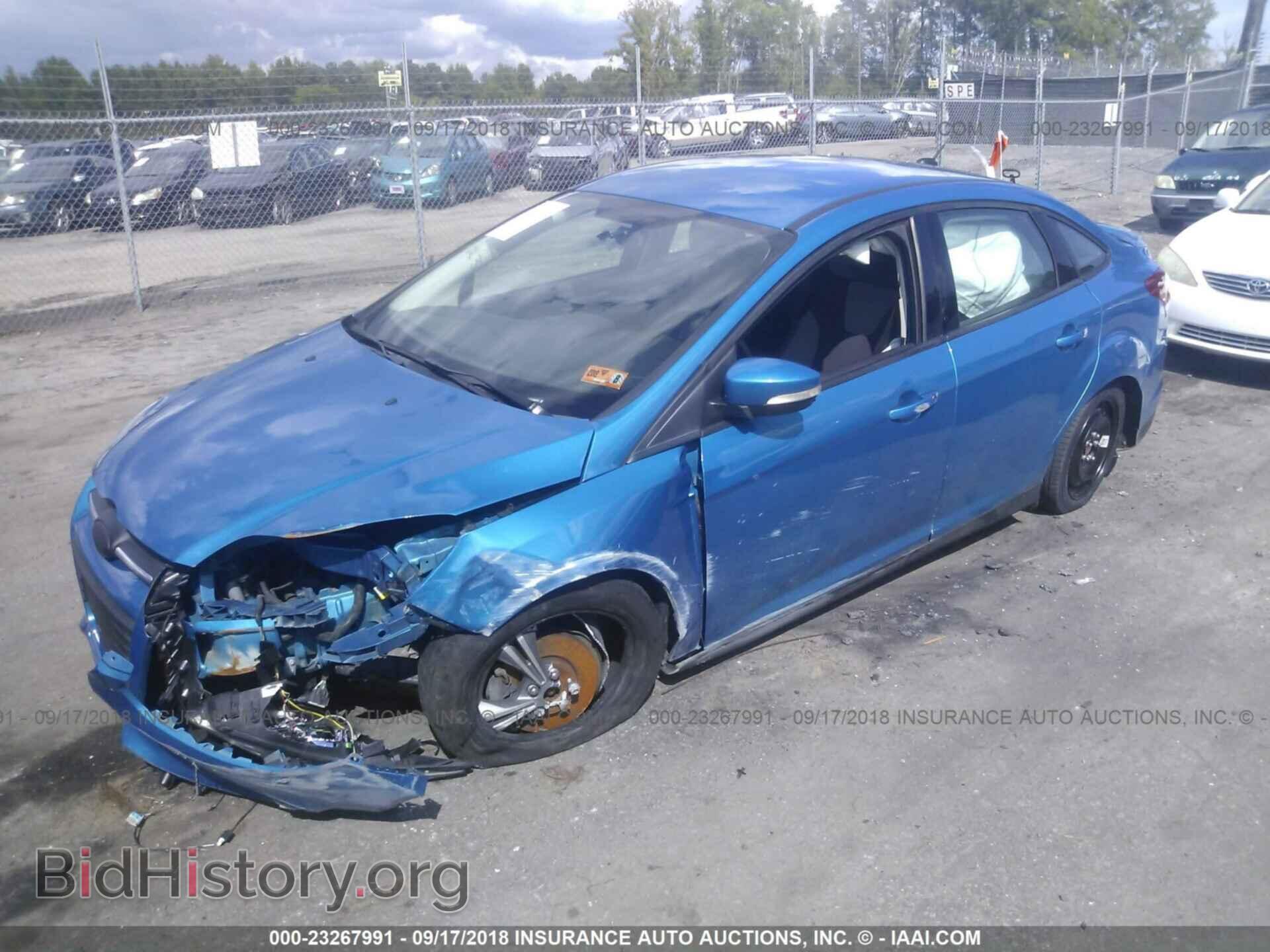 2014 Ford Focus - VIN: 1FADP3F27EL292815 - Фото 2