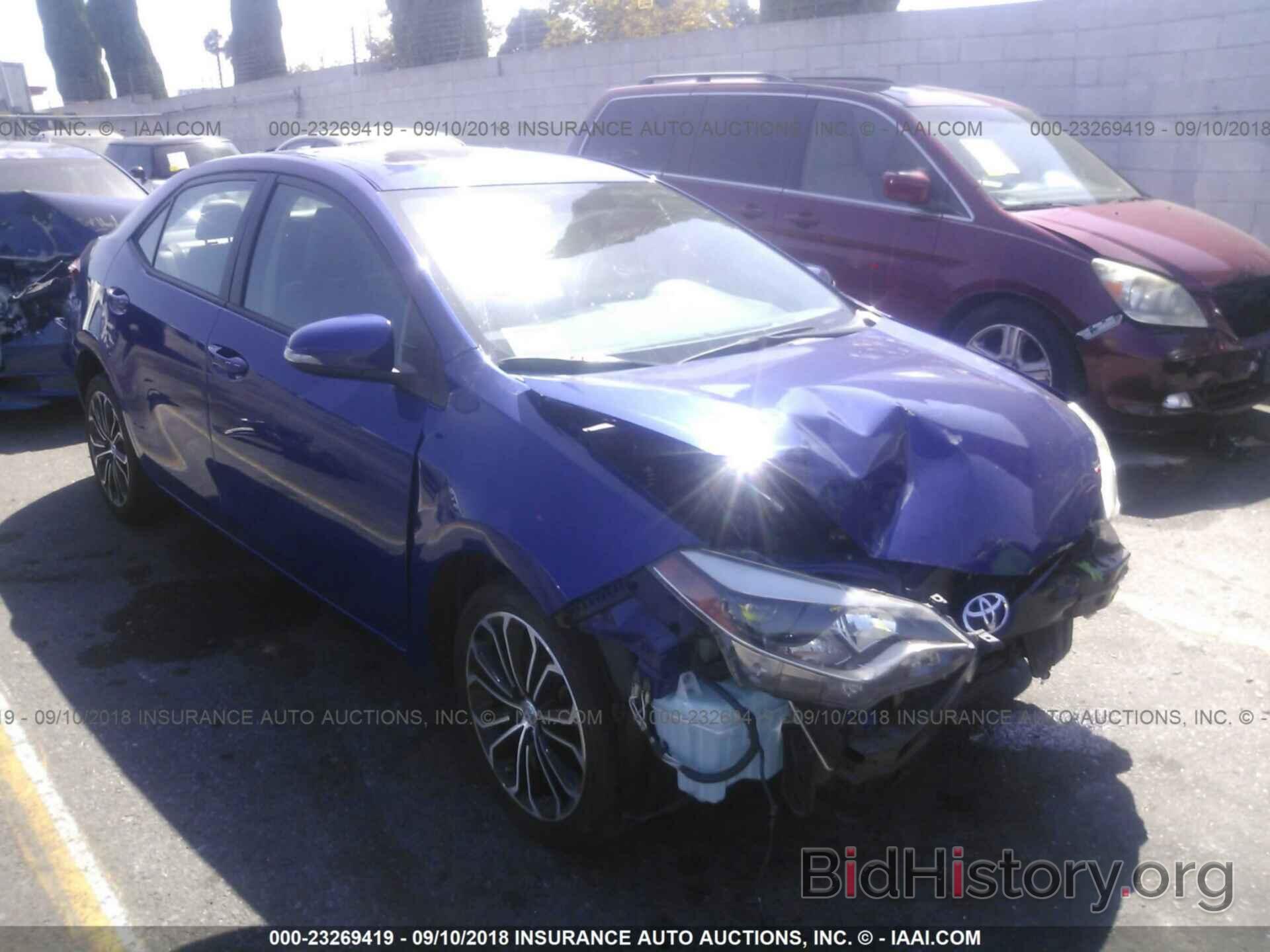 Photo 5YFBURHE6EP051565 - Toyota Corolla 2014