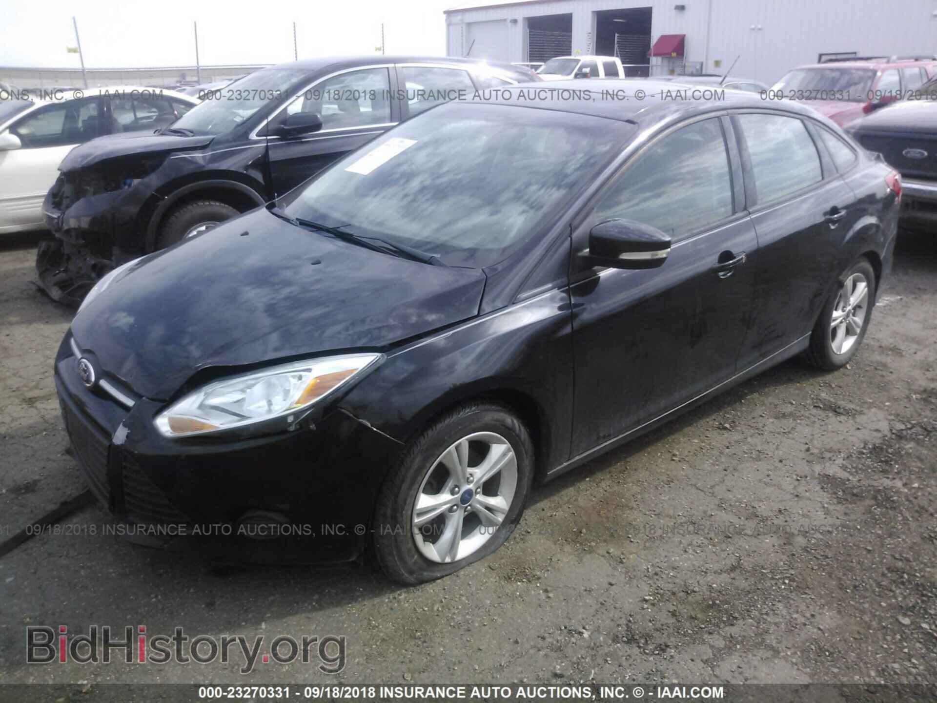2013 Ford Focus - VIN: 1FADP3F25DL219585 - Photo 2