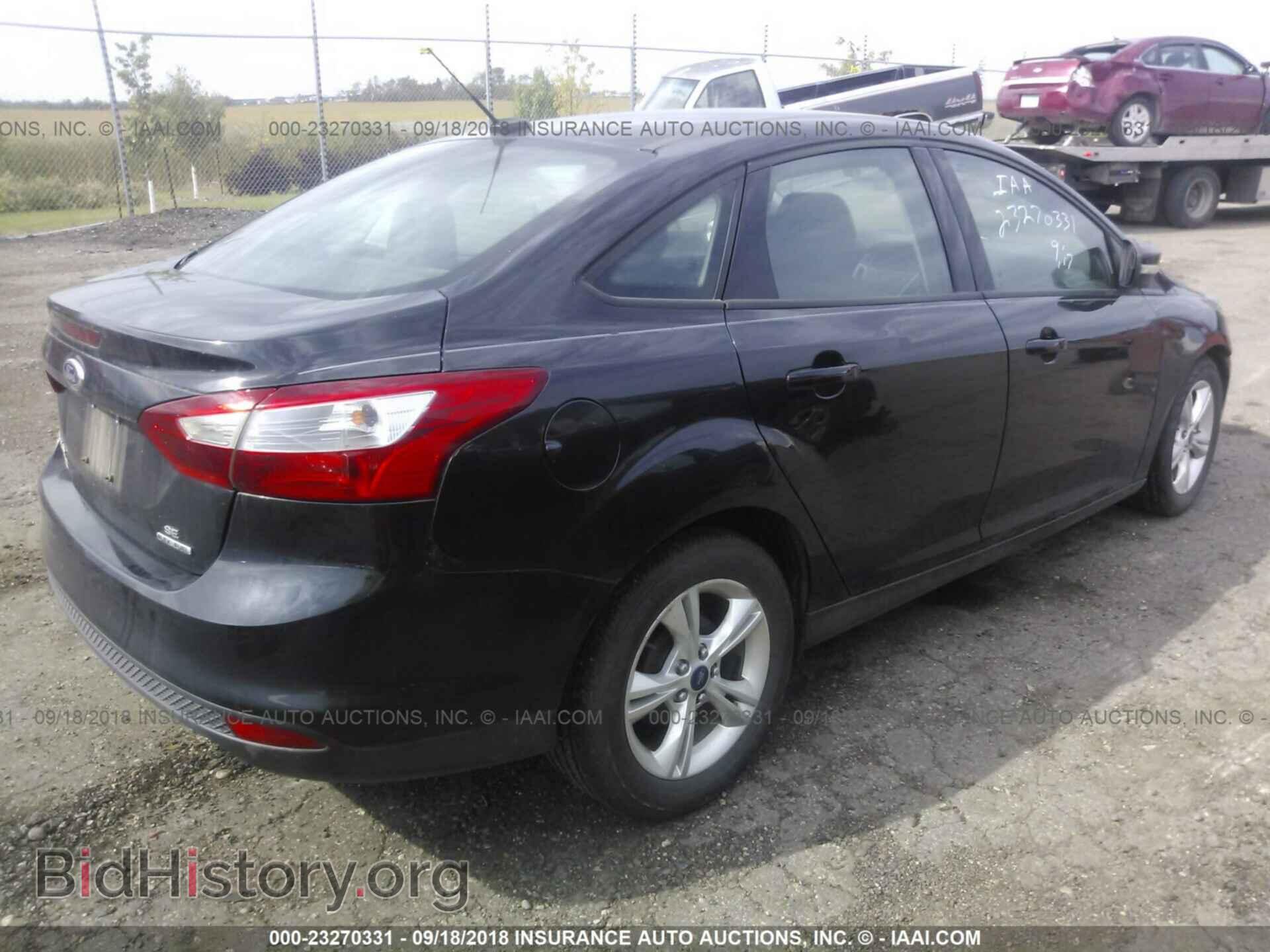 2013 Ford Focus - VIN: 1FADP3F25DL219585 - Photo 4