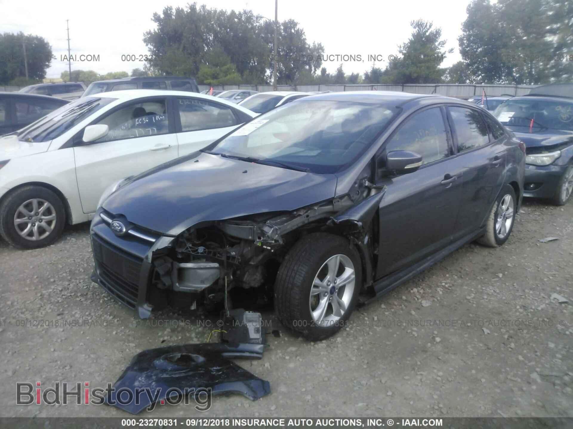 2014 Ford Focus - VIN: 1FADP3F29EL122150 - Фото 2