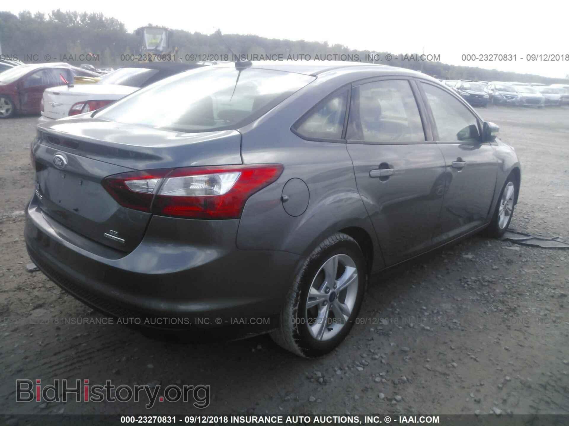 2014 Ford Focus - VIN: 1FADP3F29EL122150 - Фото 4