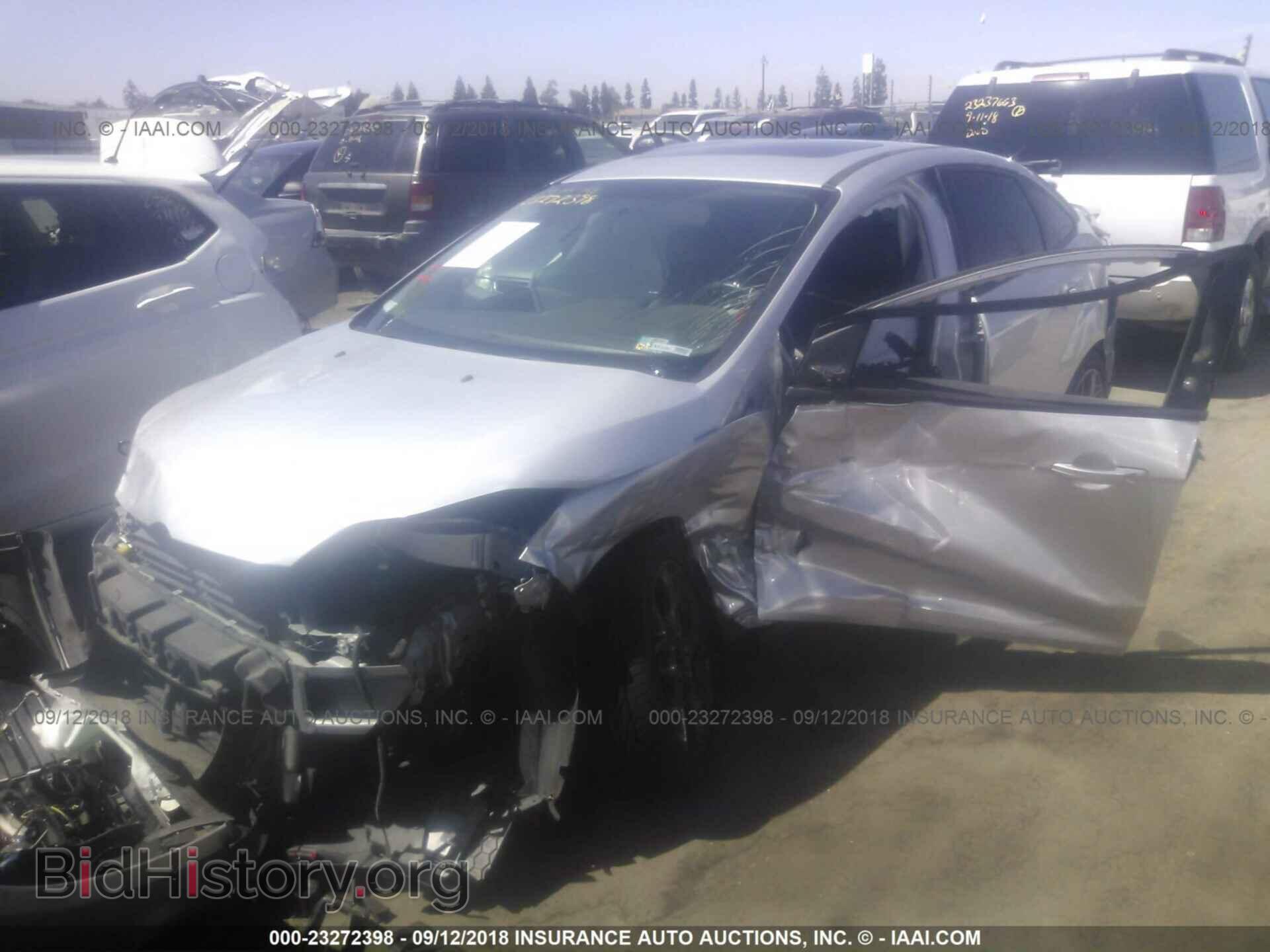 2014 Ford Focus - VIN: 1FADP3F27EL219444 - Фото 2