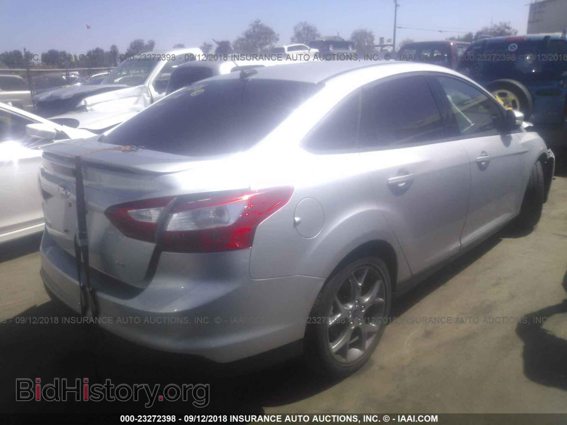 2014 Ford Focus - VIN: 1FADP3F27EL219444 - Фото 4