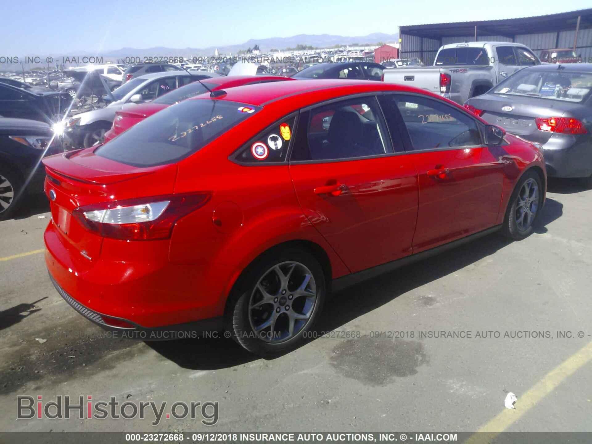2014 Ford Focus - VIN: 1FADP3F2XEL111335 - Фото 4