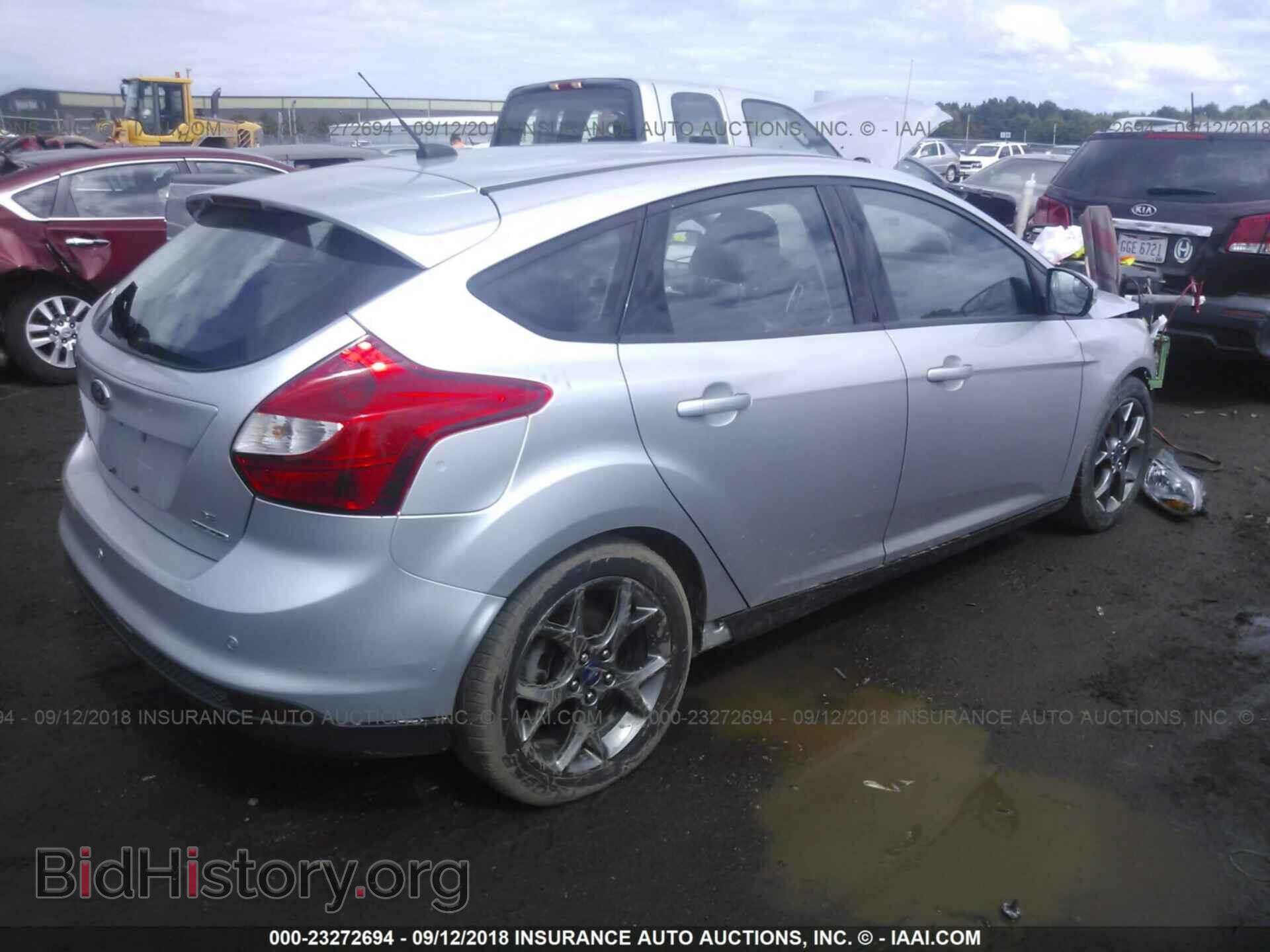 2014 Ford Focus - VIN: 1FADP3K29EL160595 - Photo 4