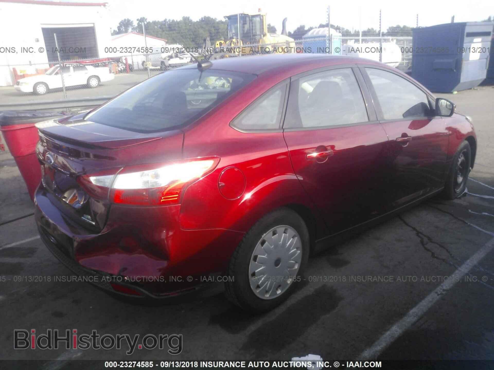 2014 Ford Focus - VIN: 1FADP3F28EL215712 - Фото 4