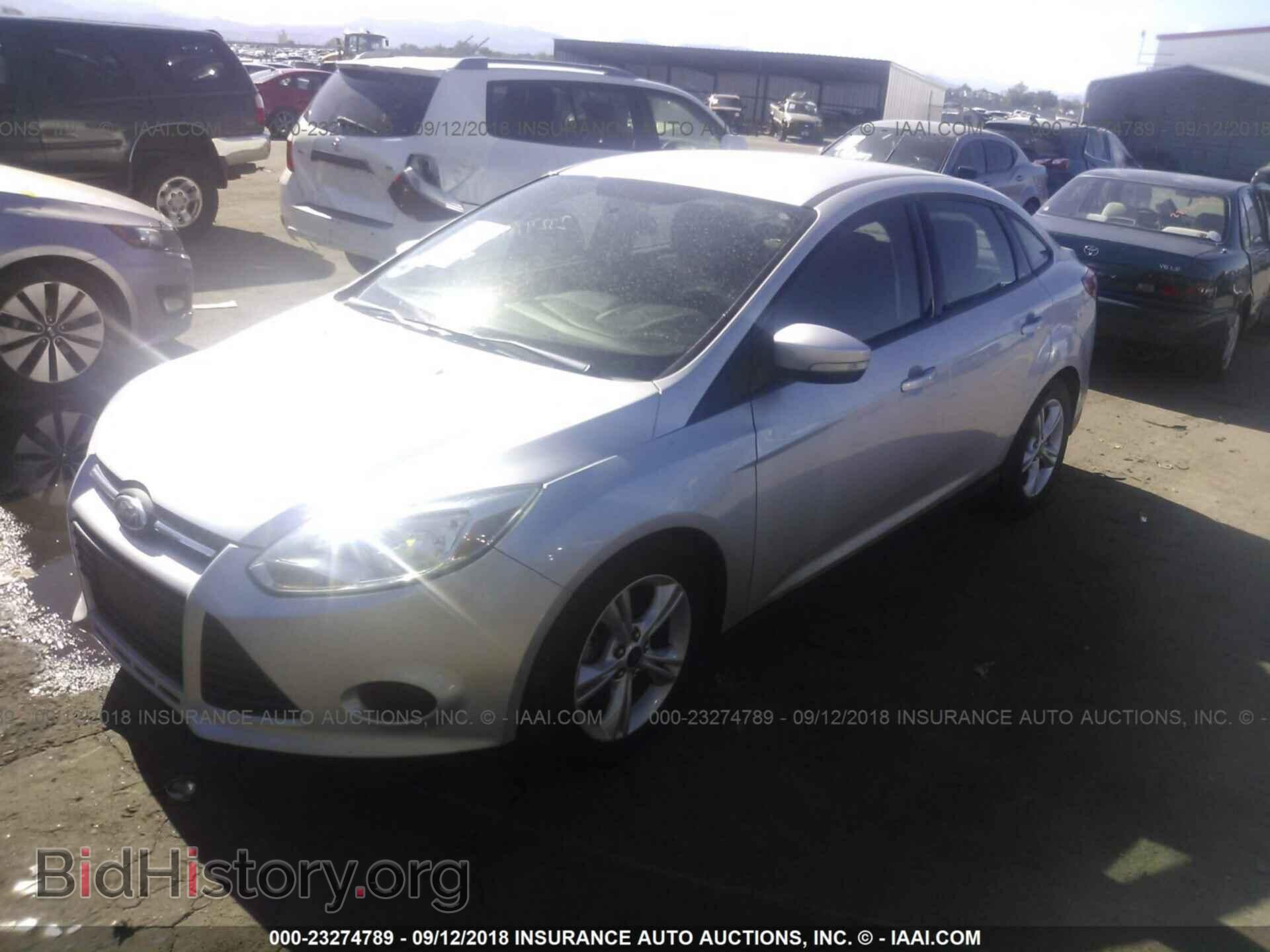 2014 Ford Focus - VIN: 1FADP3F21EL431529 - Фото 2