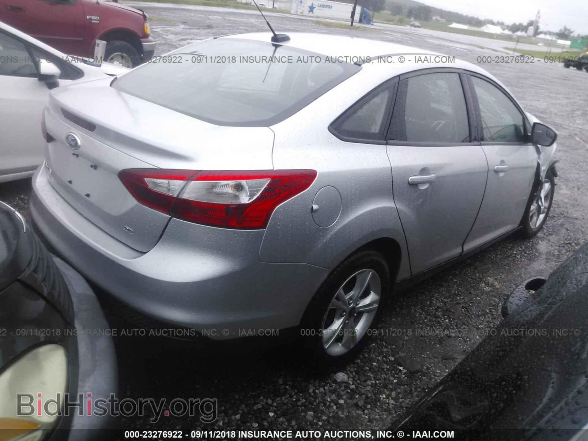 2013 Ford Focus - VIN: 1FADP3F22DL348853 - Photo 4