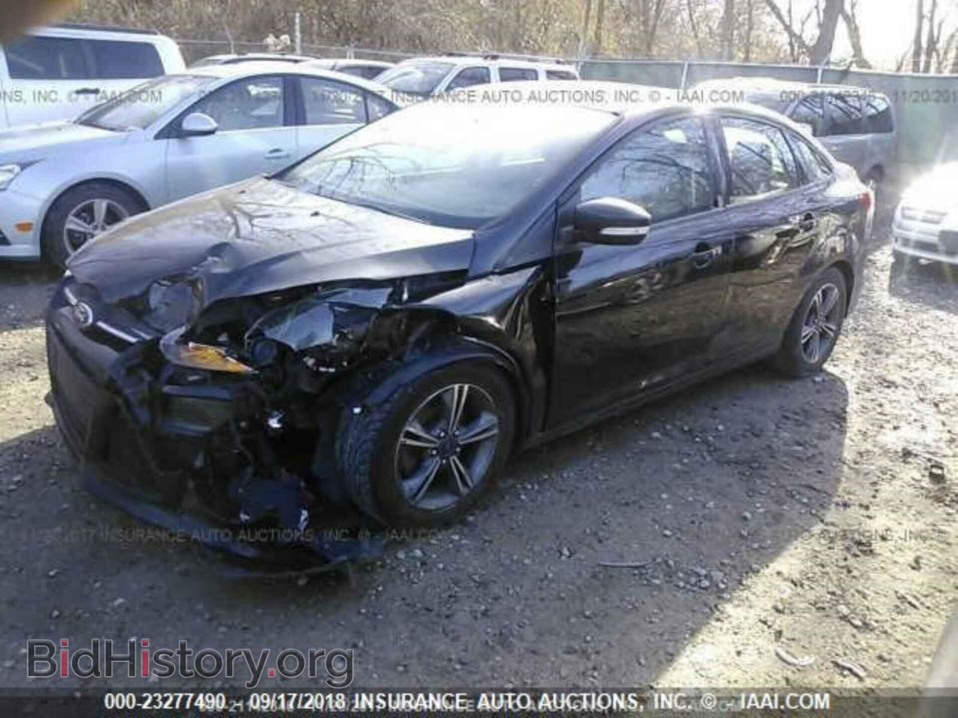 2014 Ford Focus - VIN: 1FADP3F21EL246994 - Фото 2