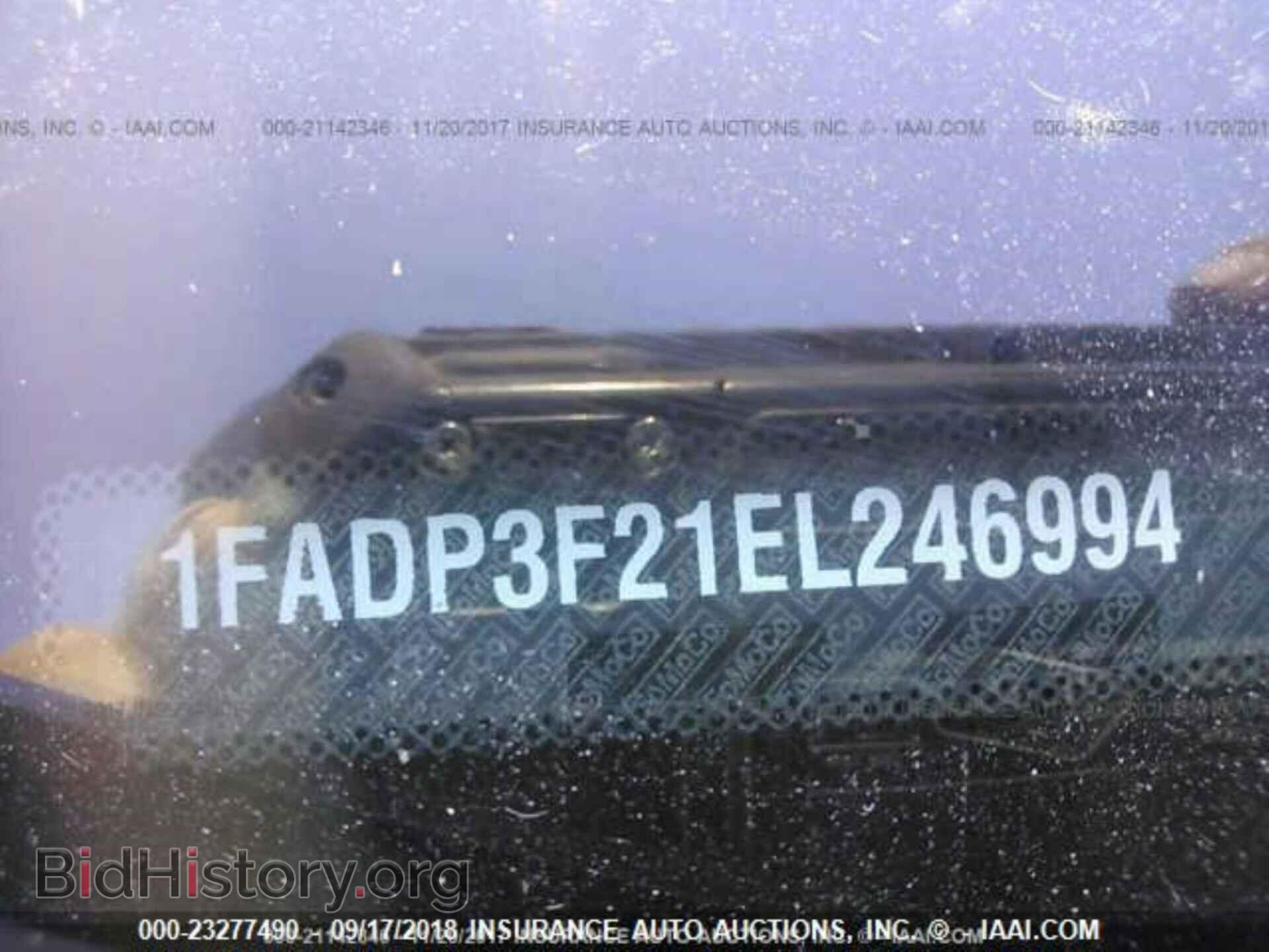 2014 Ford Focus - VIN: 1FADP3F21EL246994 - Фото 9
