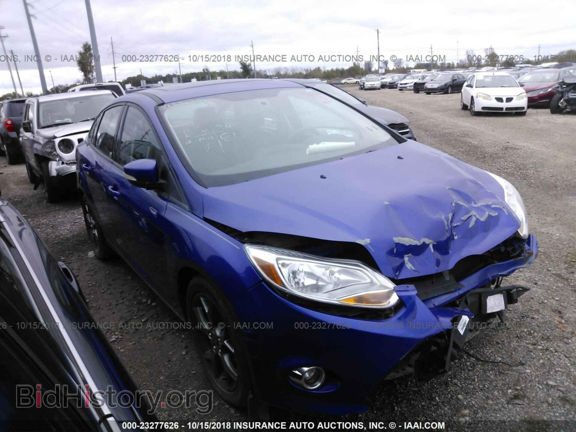 Фотография 1FADP3F21DL144027 - Ford Focus 2013