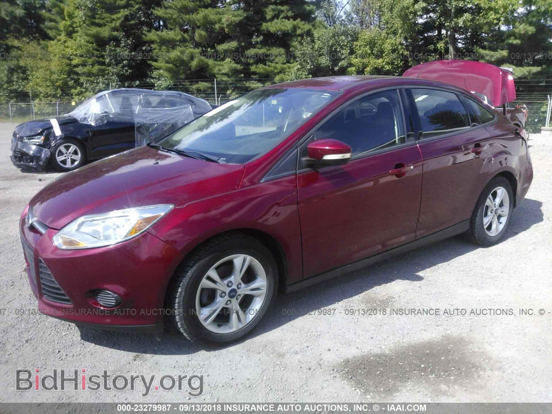 2014 Ford Focus - VIN: 1FADP3F21EL116522 - Фото 2