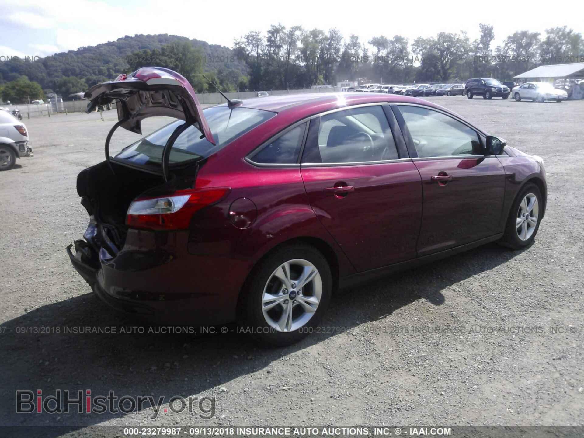 2014 Ford Focus - VIN: 1FADP3F21EL116522 - Фото 4