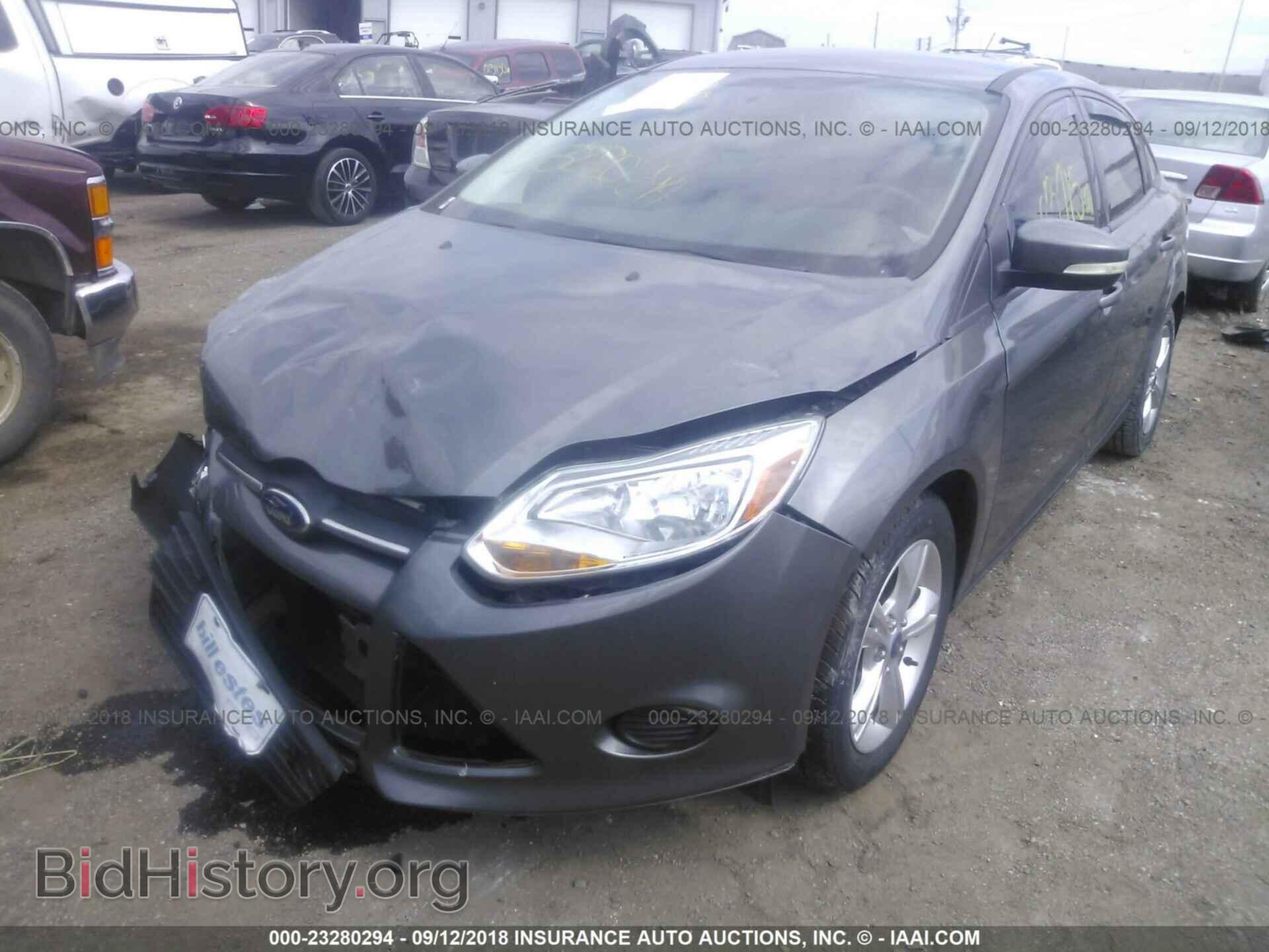 2014 Ford Focus - VIN: 1FADP3F27EL107114 - Фото 2