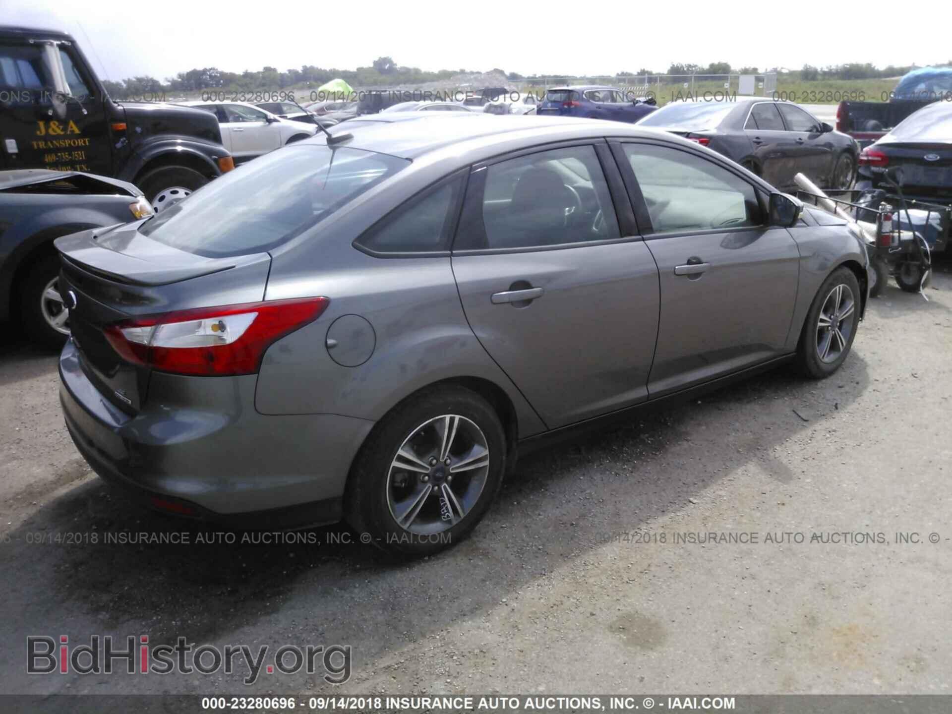 2014 Ford Focus - VIN: 1FADP3F27EL342192 - Фото 4