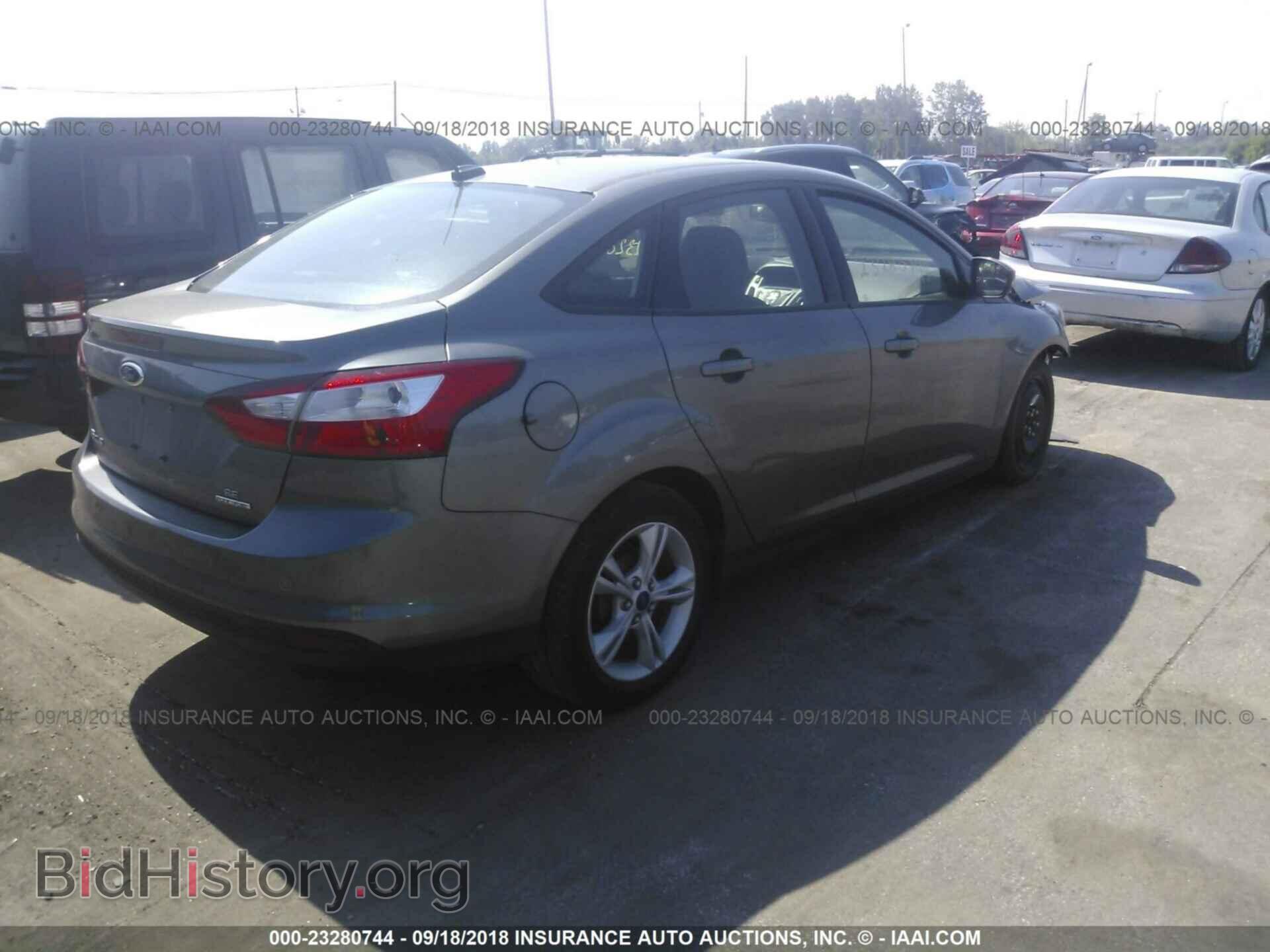 2014 Ford Focus - VIN: 1FADP3F28EL450806 - Photo 4