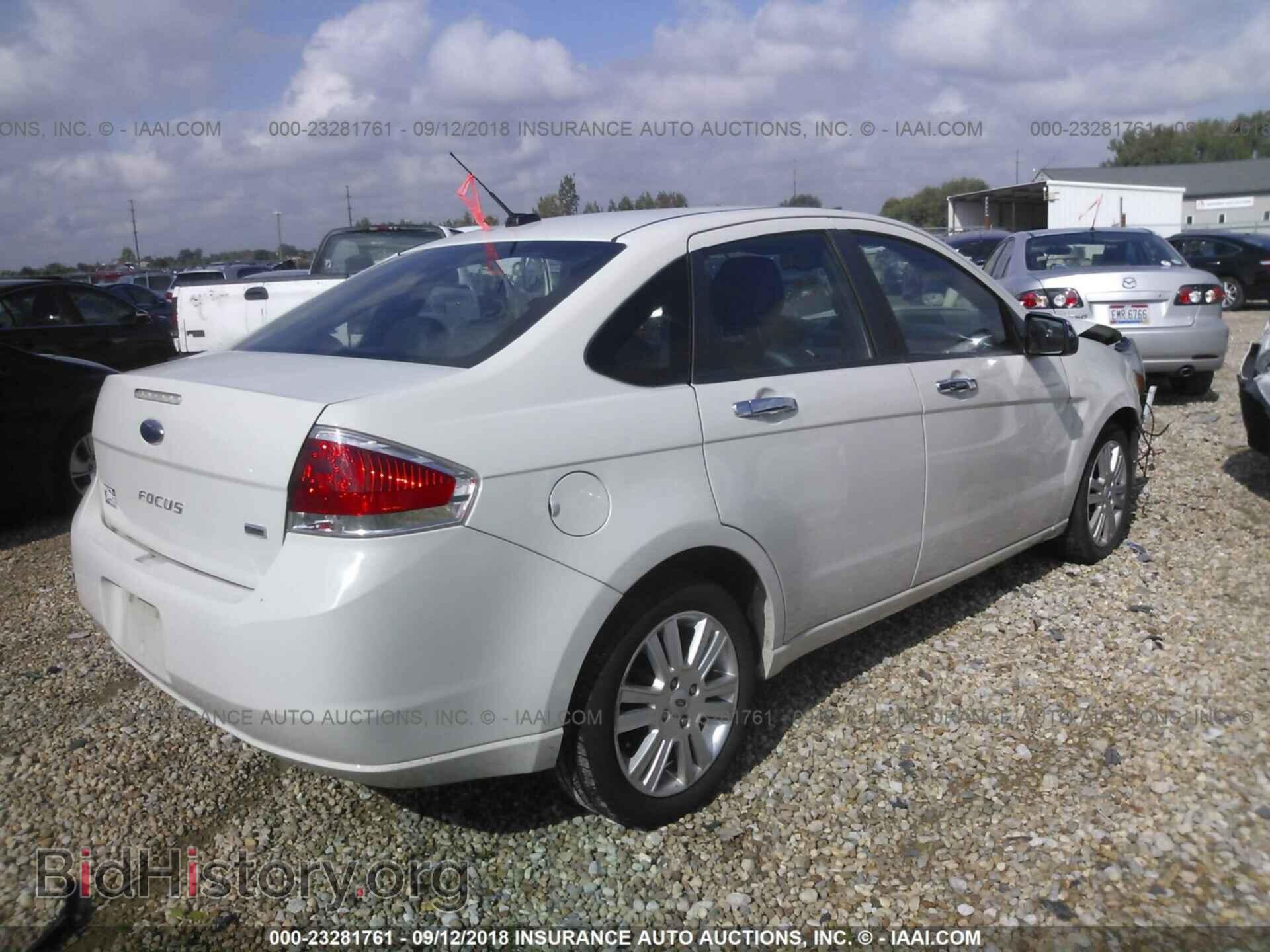 2011 Ford Focus - VIN: 1FAHP3HN2BW205020 - Фото 4