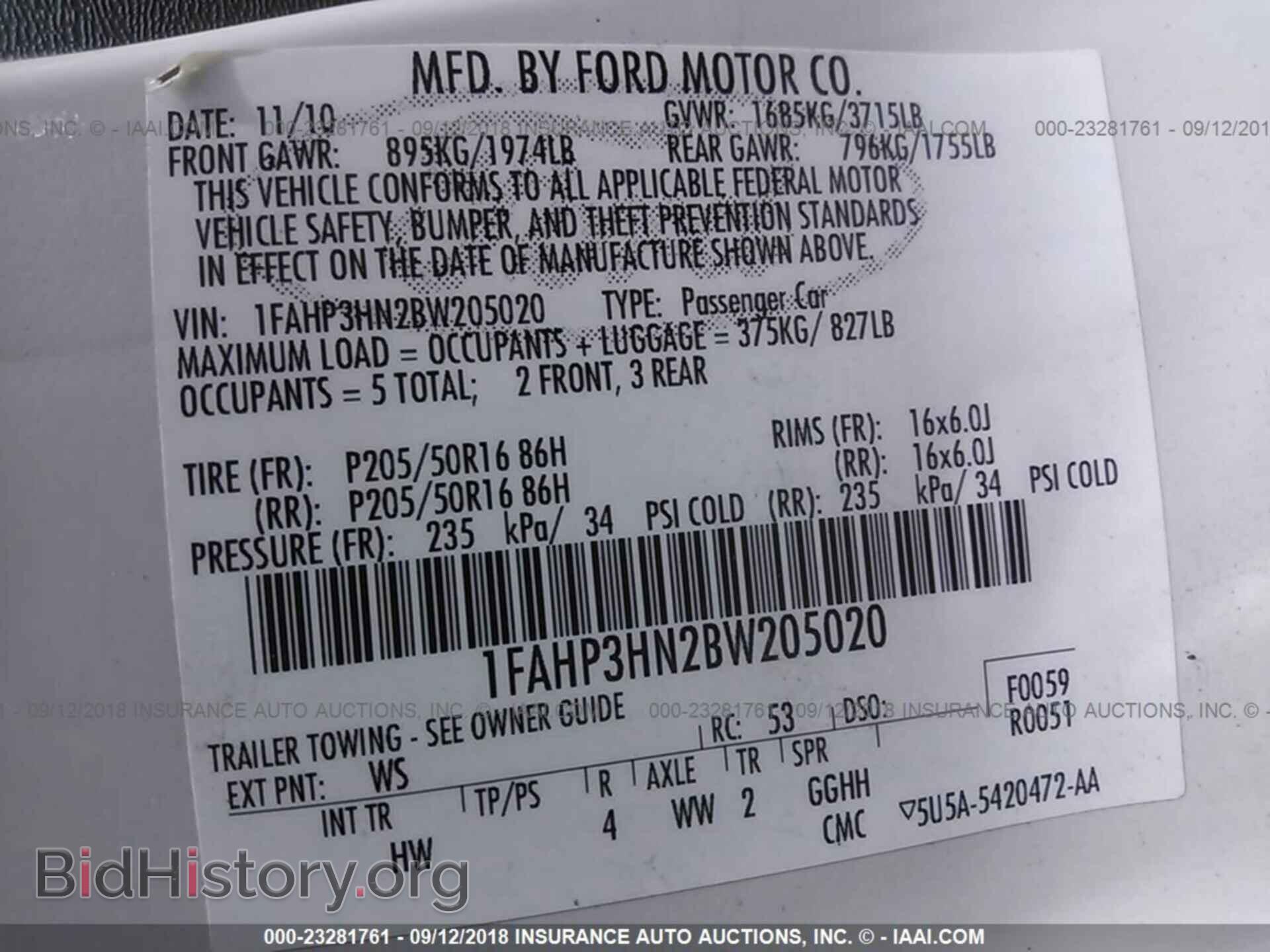 2011 Ford Focus - VIN: 1FAHP3HN2BW205020 - Фото 9