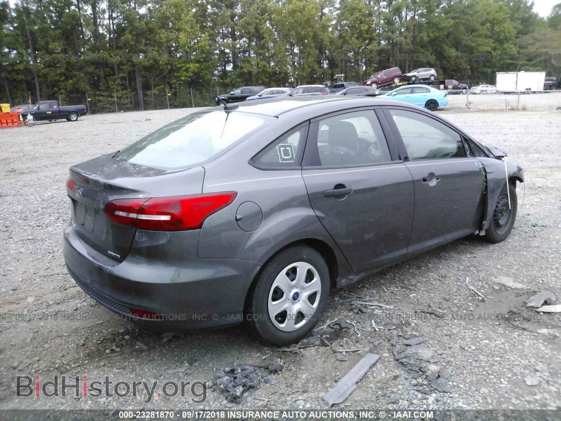 2015 Ford Focus - VIN: 1FADP3E27FL312113 - Photo 4