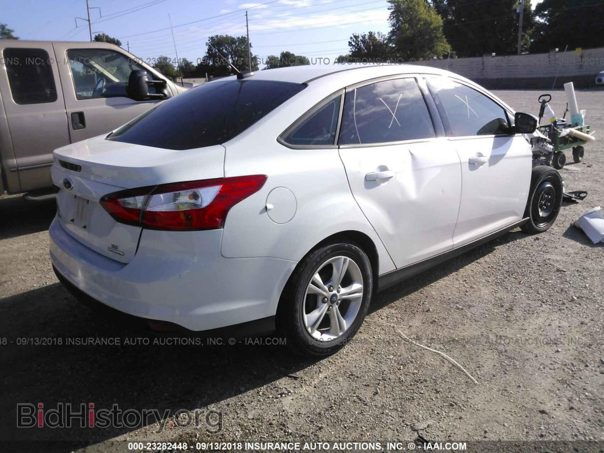 2014 Ford Focus - VIN: 1FADP3F2XEL460852 - Фото 4