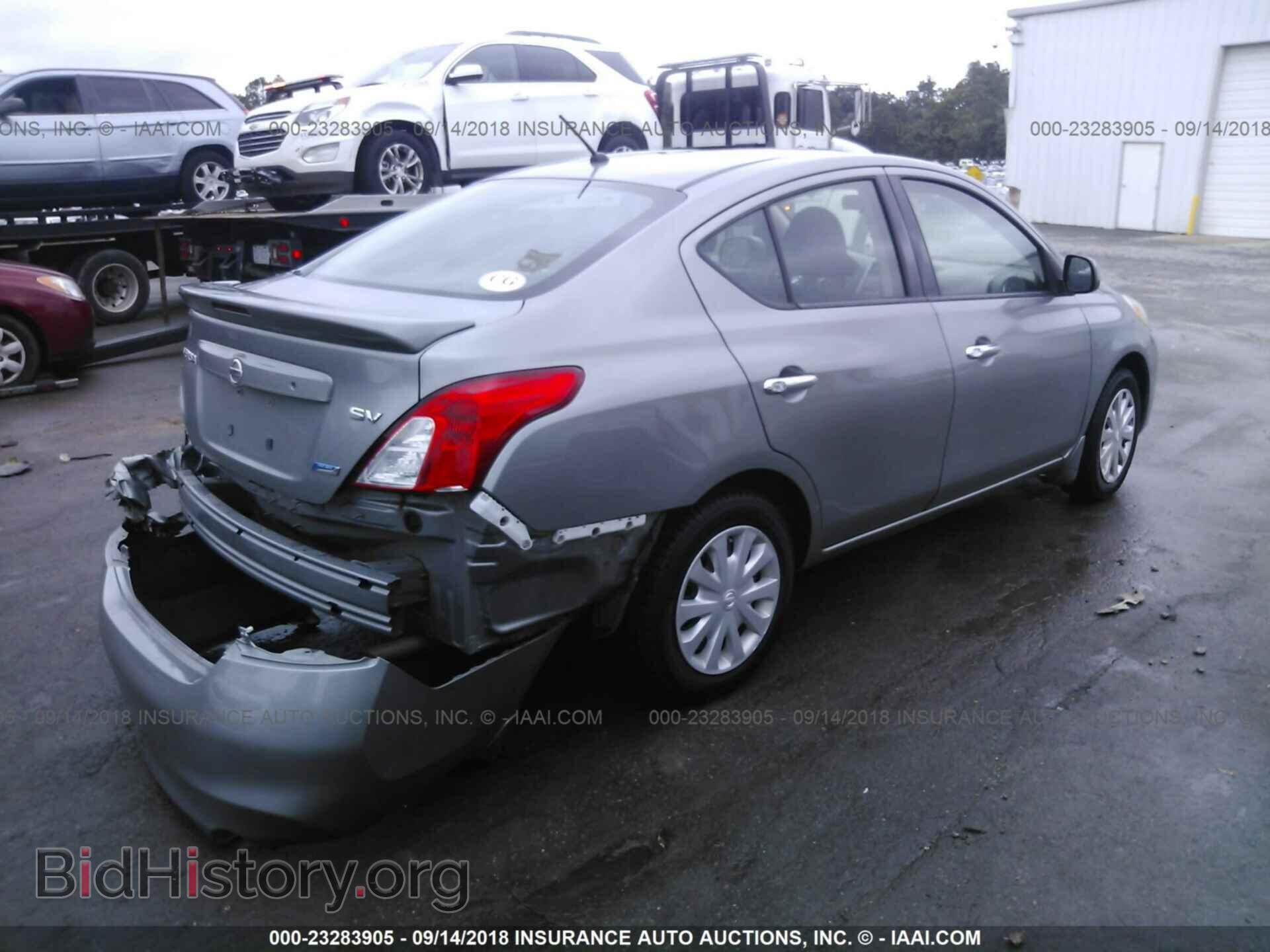 2014 Nissan Versa - VIN: 3N1CN7AP4EL826964 - Фото 4