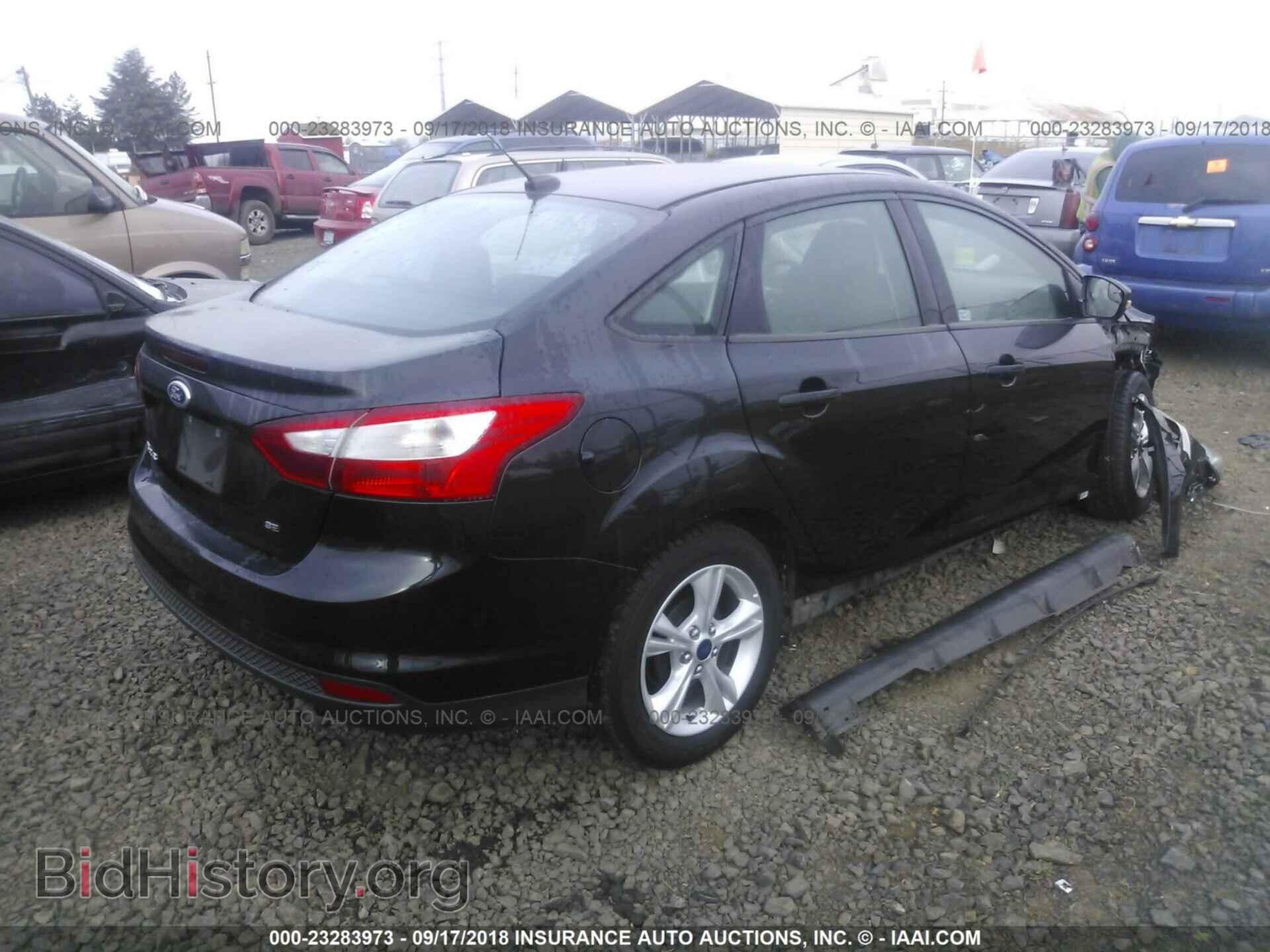 2013 Ford Focus - VIN: 1FADP3F21DL325998 - Фото 4