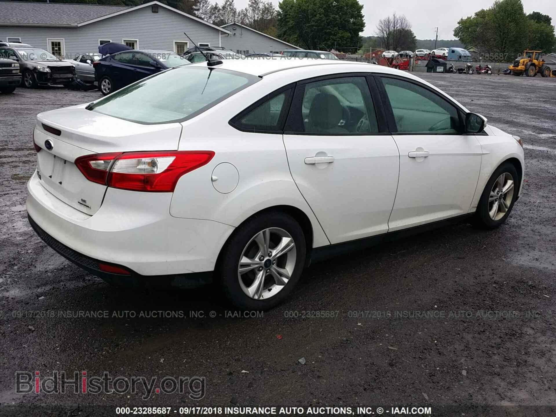 2014 Ford Focus - VIN: 1FADP3F20EL186965 - Фото 4