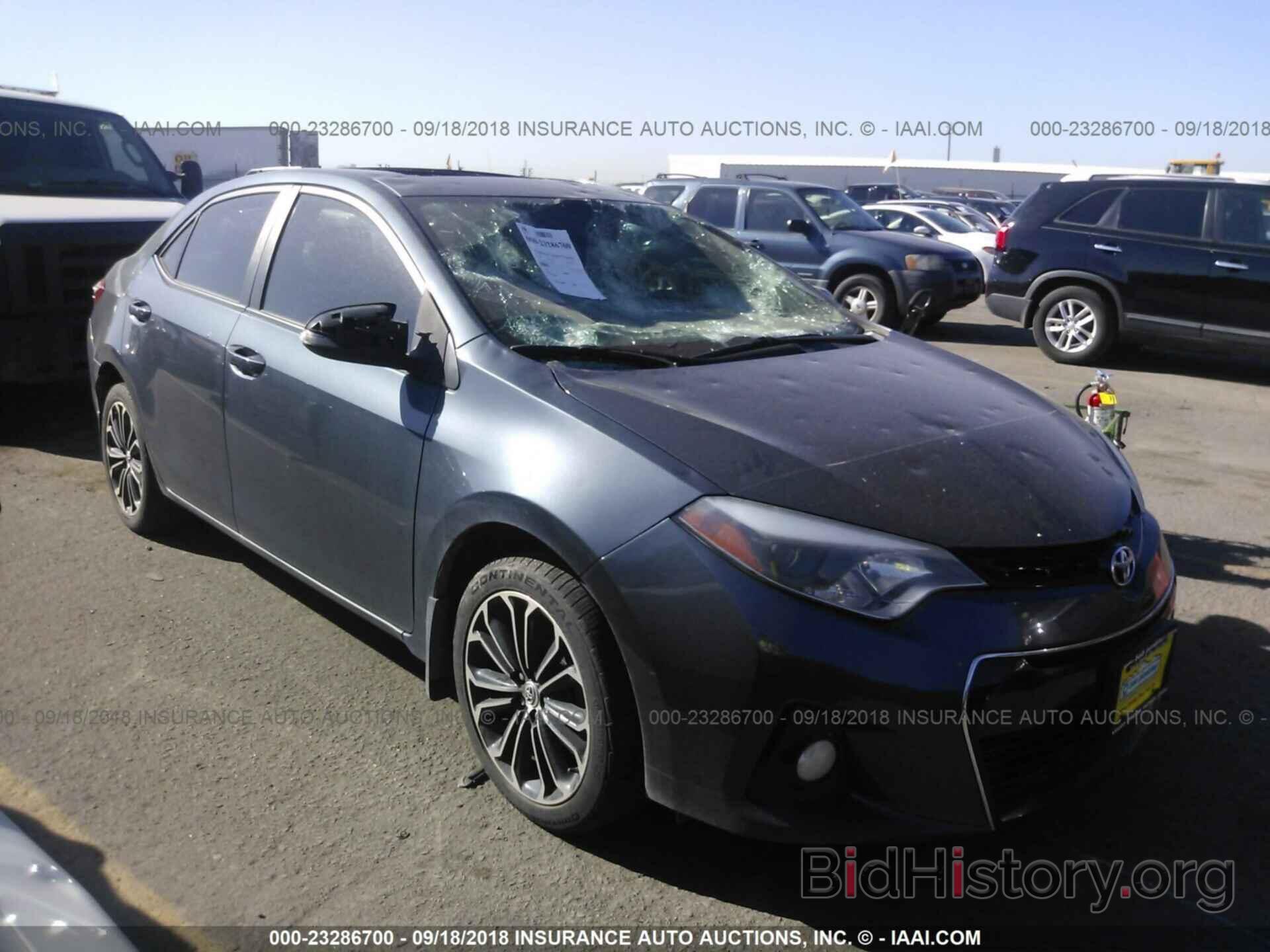 Photo 5YFBURHE2EP104259 - Toyota Corolla 2014