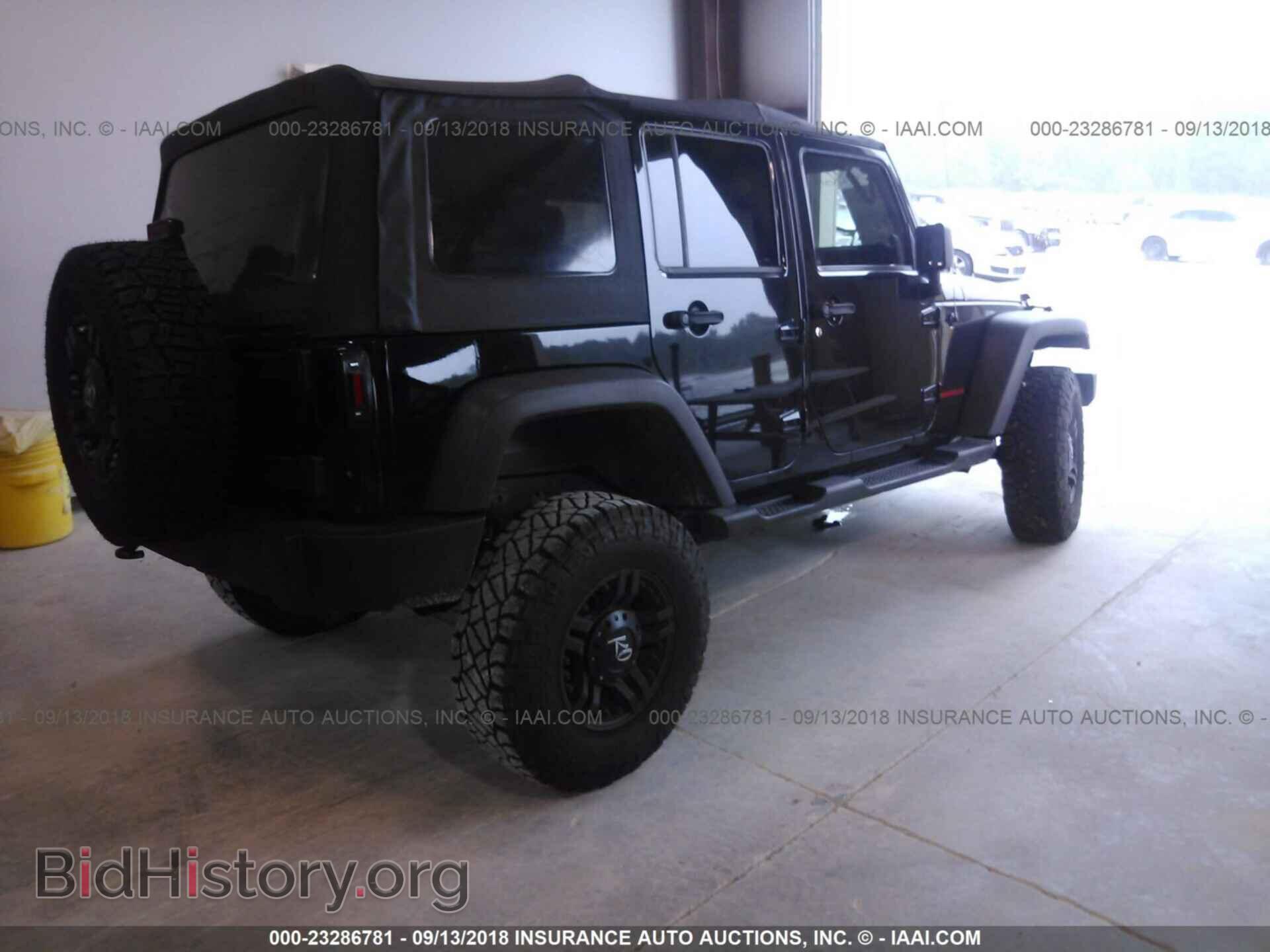 2012 Jeep Wrangler - VIN: 1C4BJWDG4CL234967 - Фото 4